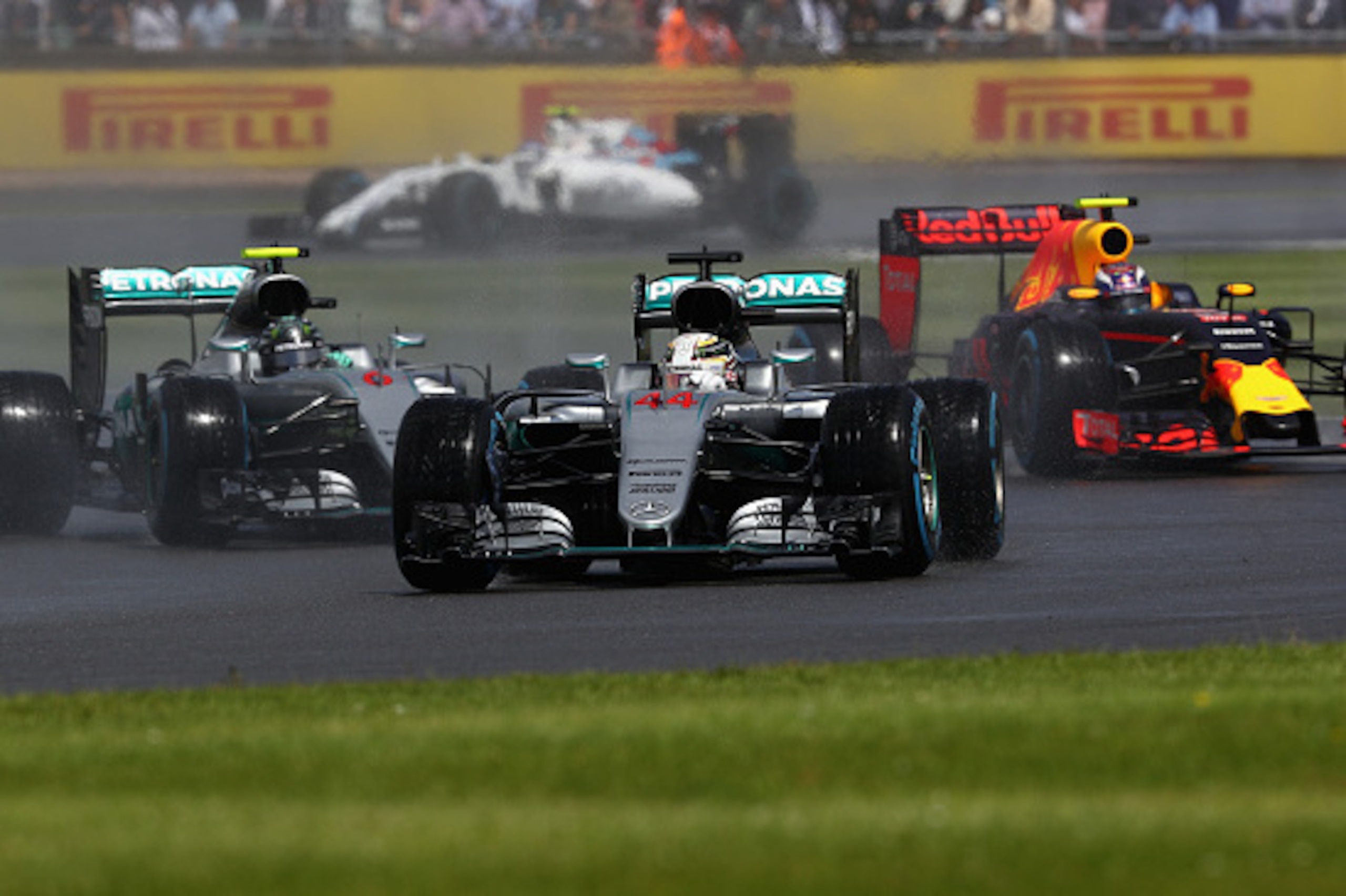 NORTHAMPTON, ENGLAND - JULY 10:  Lewis Hamilton of Great Britain driving the (44) Mercedes AMG Petronas F1 Team Mercedes F1 WO7 Mercedes PU106C Hybrid turbo leads Nico Rosberg of Germany driving the (6) Mercedes AMG Petronas F1 Team Mercedes F1 WO7 Merced