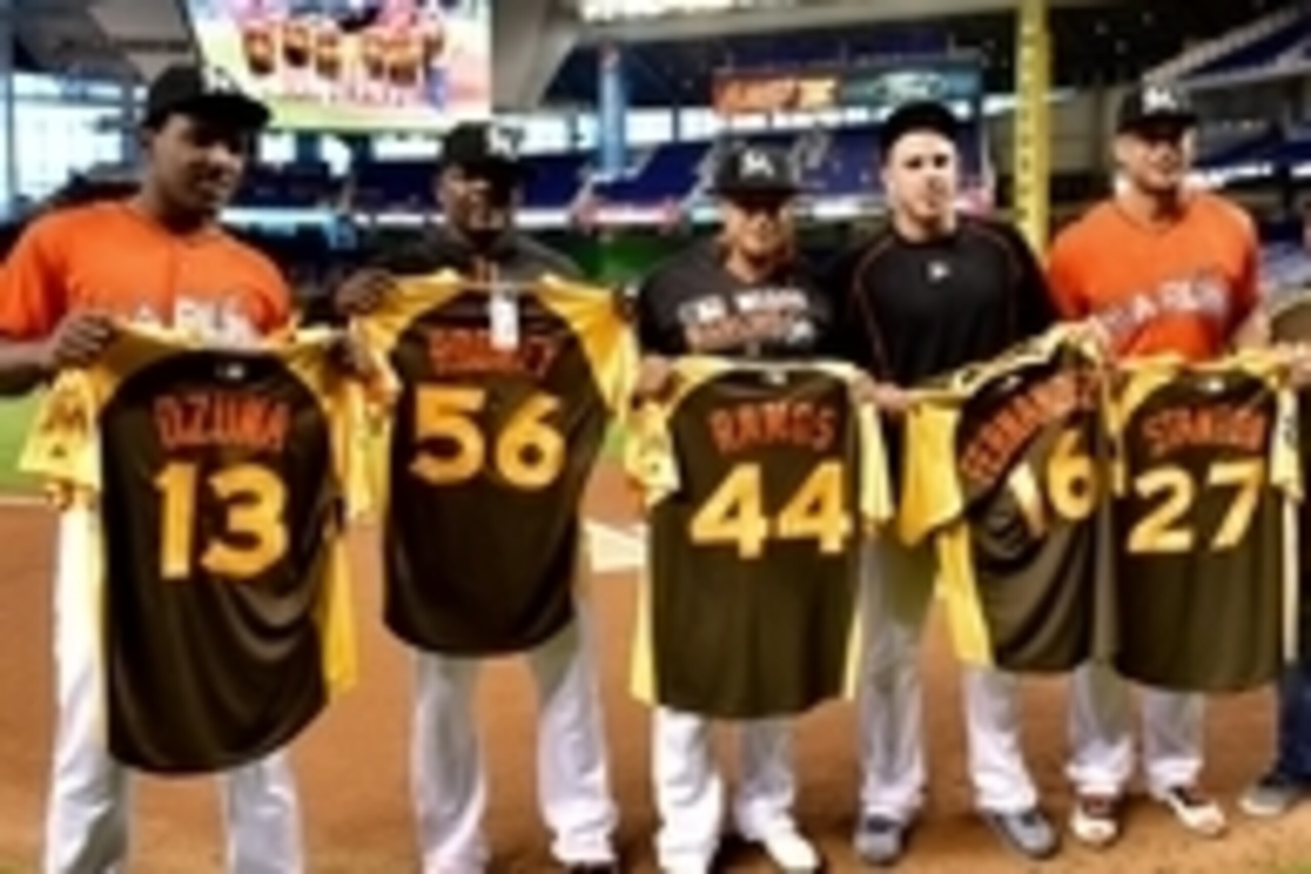 Jul 10, 2016; Miami, FL, USA; Miami Marlins center fielder Marcell Ozuna (left to right) show off their all-star jerseys relief pitcher Fernando Rodney and relief pitcher A.J. Ramos and starting pitcher Jose Fernandez and right fielder Giancarlo Stanton b Jul 10, 2016; Miami, FL, USA; Miami Marlins center fielder Marcell Ozuna (left to right) show off their all-star jerseys relief pitcher Fernando Rodney and relief pitcher A.J. Ramos and starting pitcher Jose Fernandez and right fielder Giancarlo Stanton b