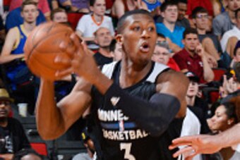 LAS VEGAS, NV - JULY 10: Kris Dunn #3 of the Minnesota Timberwolves drives to the basket against the Toronto Raptors during the 2016 Las Vegas Summer League on July 10, 2016 at Cox Pavillon in Las Vegas, Nevada. NOTE TO USER: User expressly acknowledges a