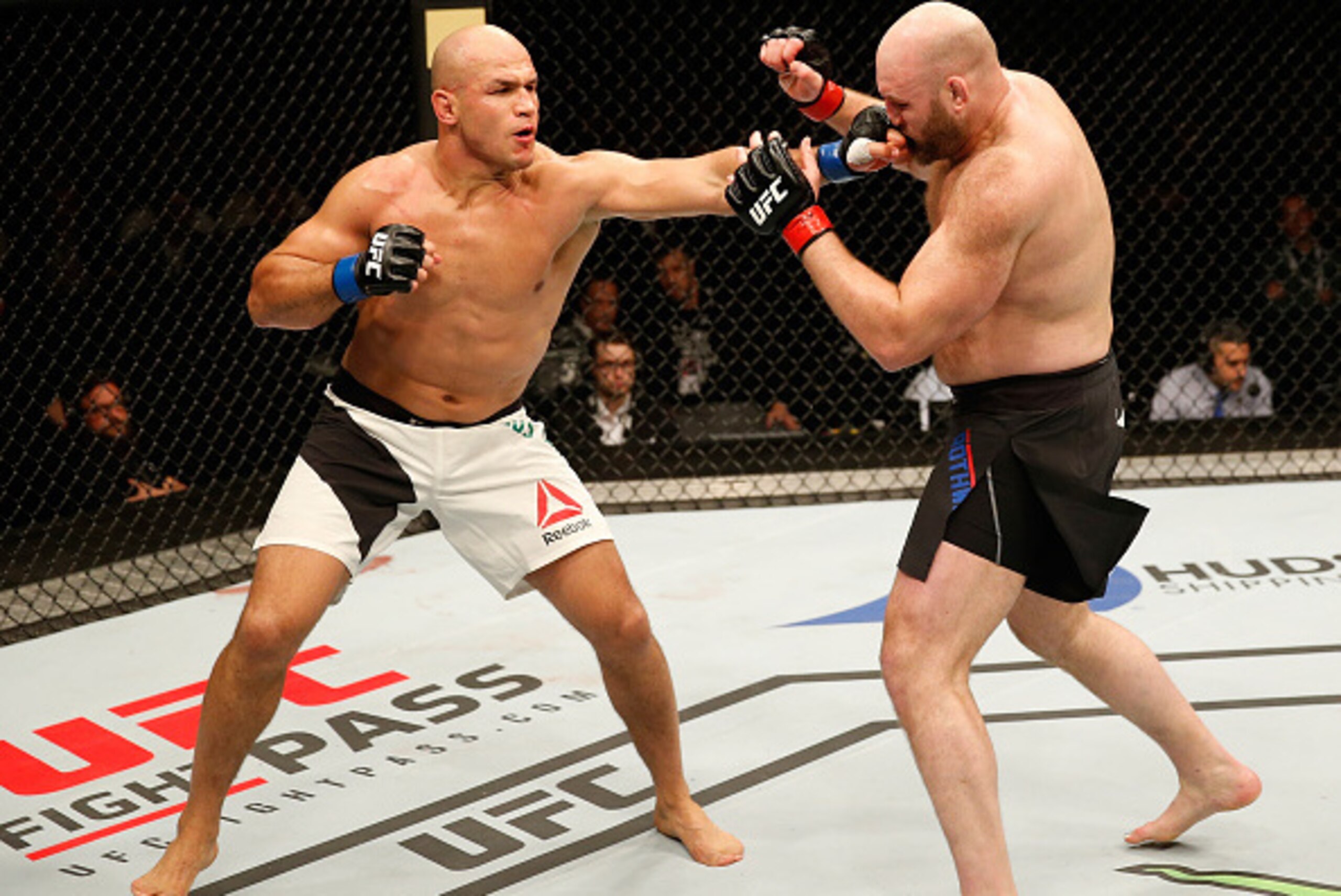 ZAGREB, CROATIA - APRIL 10:   (L-R) Junior Dos Santos punches Ben Rothwell in their heavyweight bout during the UFC Fight Night event at the Arena Zagreb on April 10, 2016 in Zagreb, Croatia. (Photo by Srdjan Stevanovic/Zuffa LLC/Zuffa LLC via Getty Image