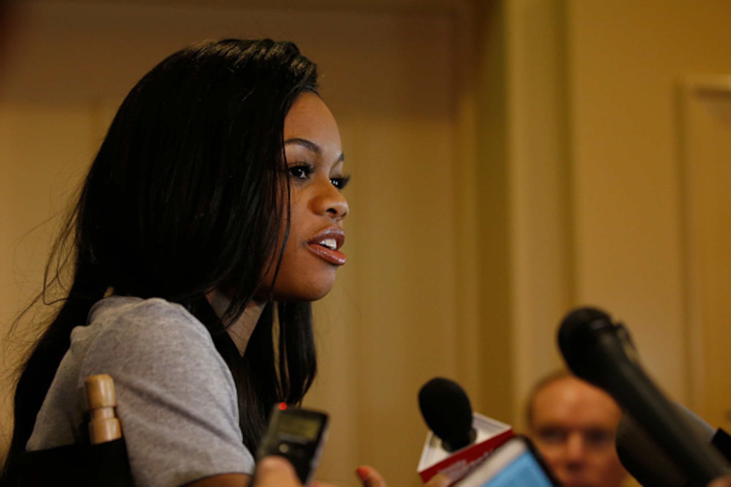 BEVERLY HILLS, CA - MARCH 07:  Gymnast Gabby Douglas addresses the media at the USOC Olympic Media Summit at The Beverly Hilton Hotel on March 7, 2016 in Beverly Hills, California.  (Photo by Todd Warshaw/Getty Images for the USOC)