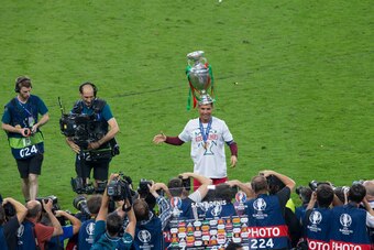 PARIS, FRANCE - JULY 10:  Portugal's Cristiano Ronaldo poses with the winners trophy during the UEFA Euro 2016 Final match between Portugal and France at Stade de Lyon on July 10 in Paris, France.  (Photo by Craig Mercer/CameraSport via Getty Images)