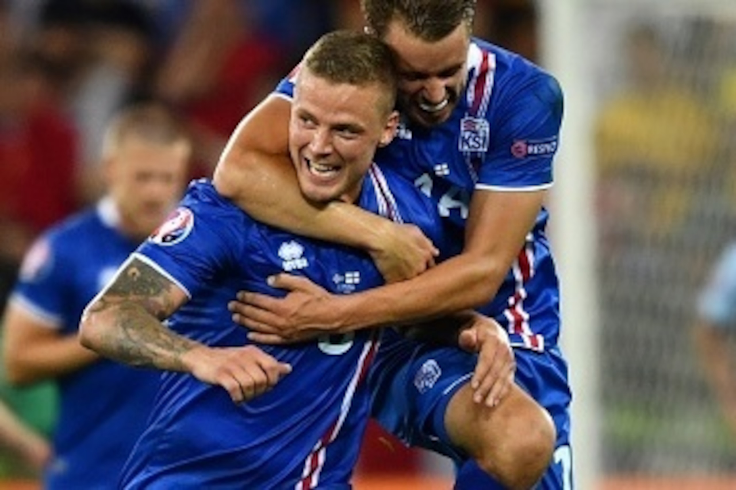 (LtoR) Iceland's defender Ragnar Sigurdsson and Iceland's defender Kari Arnason celebrate their team's win after the Euro 2016 round of 16 football match between England and Iceland at the Allianz Riviera stadium in Nice on June 27, 2016.
Iceland won th (LtoR) Iceland's defender Ragnar Sigurdsson and Iceland's defender Kari Arnason celebrate their team's win after the Euro 2016 round of 16 football match between England and Iceland at the Allianz Riviera stadium in Nice on June 27, 2016.
Iceland won th