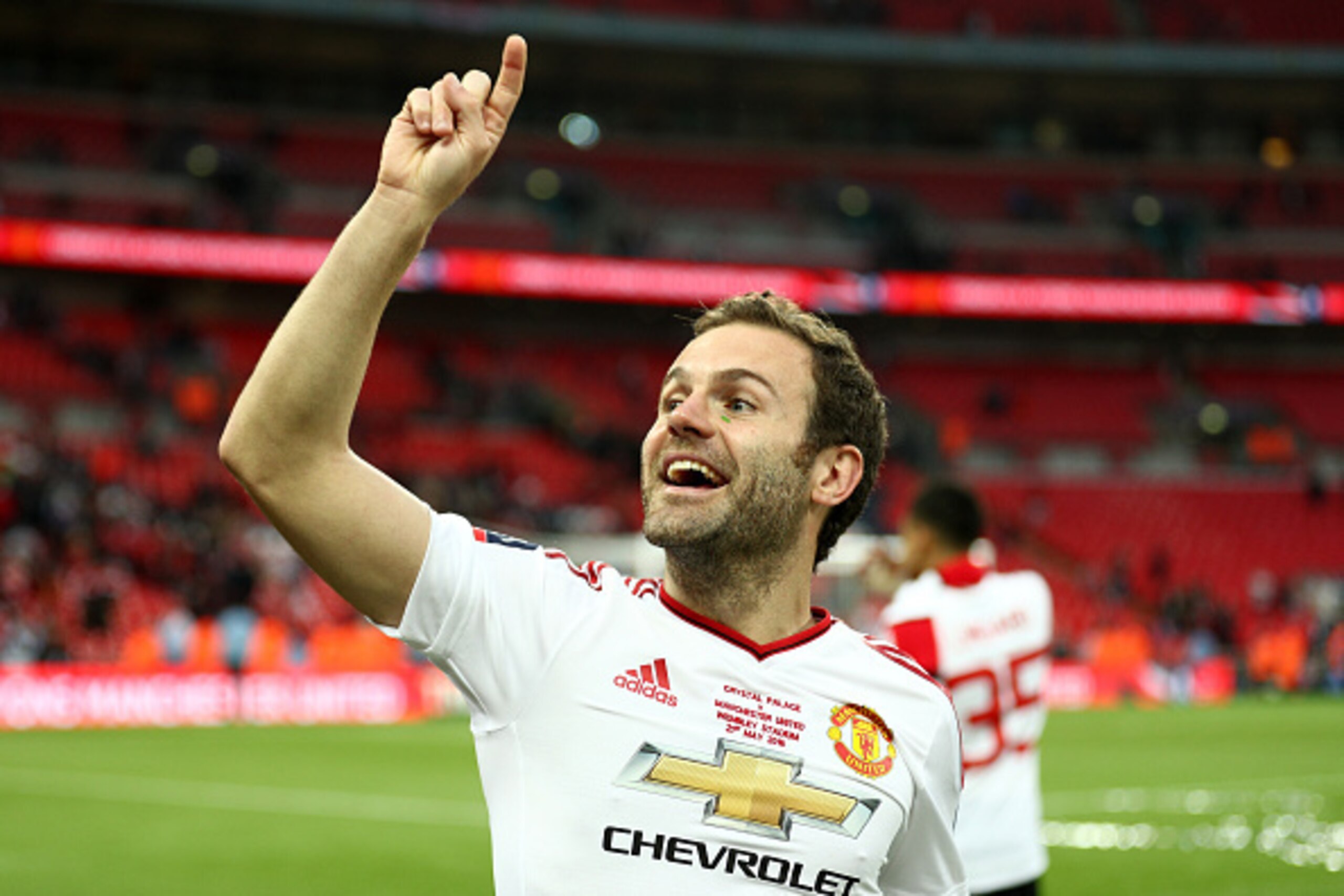 LONDON, ENGLAND - MAY 21:  Juan Mata of Manchester United celebrates victory on the pitch after The Emirates FA Cup Final match between Manchester United and Crystal Palace at Wembley Stadium on May 21, 2016 in London, England.  (Photo by Paul Gilham/Gett