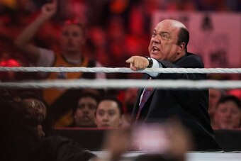 Paul Heyman at ringside.