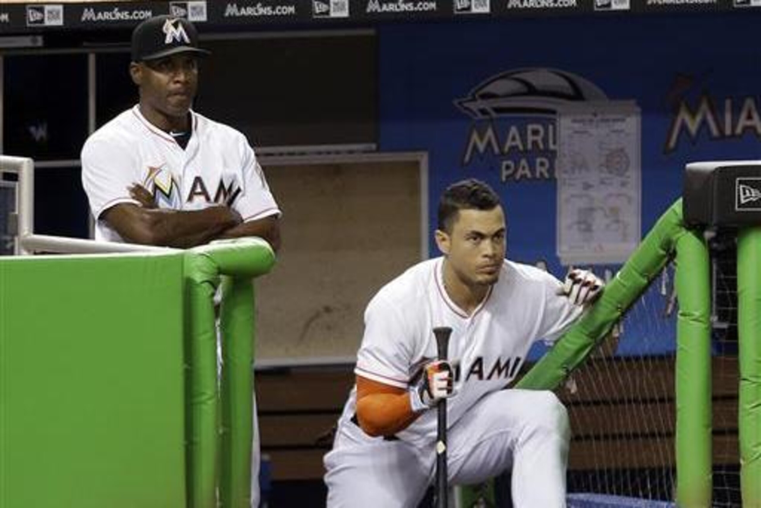 Stanton, seen here with Marlins hitting coach Barry Bonds, struggled at times in the first half but went on a power binge before the break. Stanton, seen here with Marlins hitting coach Barry Bonds, struggled at times in the first half but went on a power binge before the break.