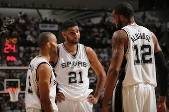 SAN ANTONIO, TX - APRIL 30: Tim Duncan #21, Tony Parker #9 and LaMarcus Aldridge #12 of the San Antonio Spurs are seen against the Oklahoma City Thunder in Game One of Western Conference Semifinals of the 2016 NBA Playoffs on April 30, 2016 at the AT&T Ce