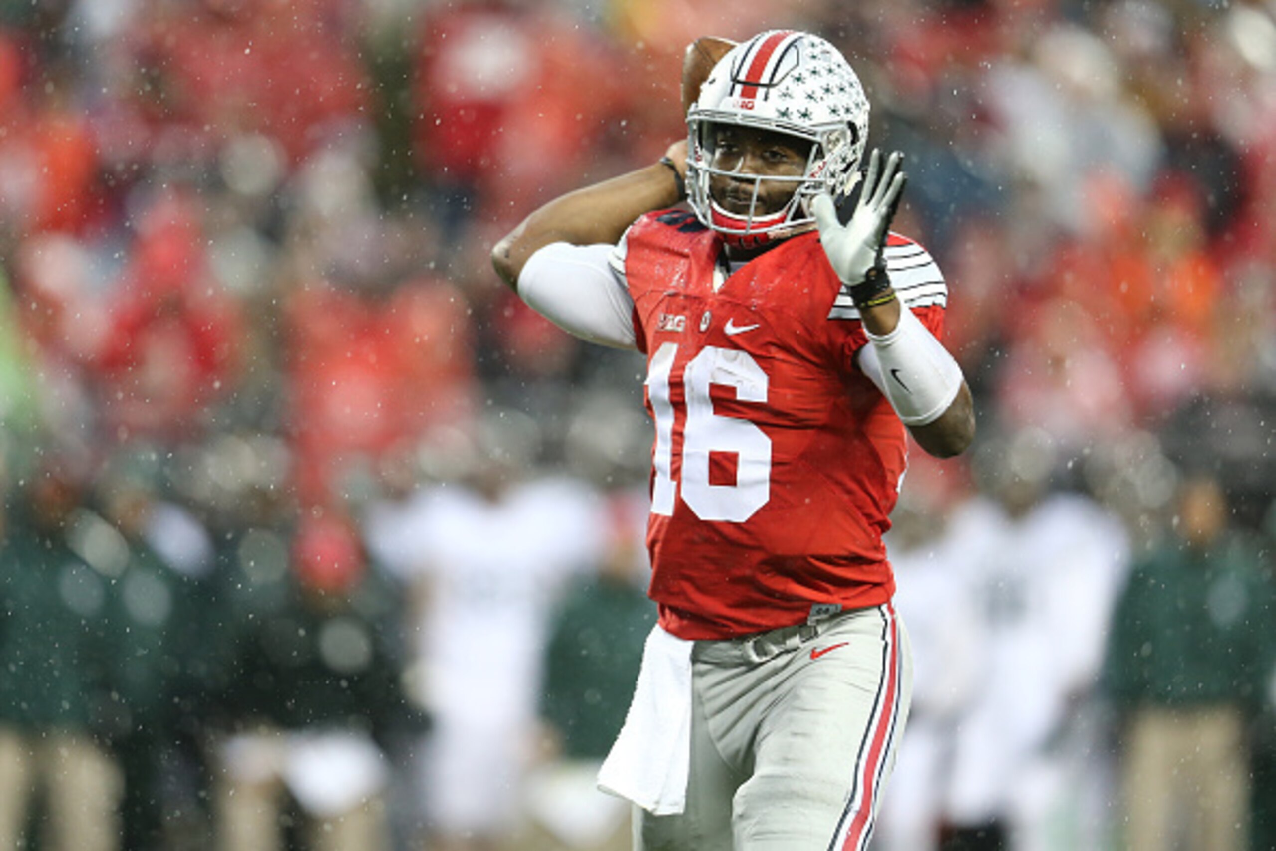 COLUMBUS, OH - NOVEMBER 21: J.T. Barrett #16 of the Ohio State Buckeyes drops back to pass in the second quarter against the Michigan State Spartans at Ohio Stadium on November 21, 2015 in Columbus, Ohio. (Photo by Rey Del Rio/Getty Images) COLUMBUS, OH - NOVEMBER 21: J.T. Barrett #16 of the Ohio State Buckeyes drops back to pass in the second quarter against the Michigan State Spartans at Ohio Stadium on November 21, 2015 in Columbus, Ohio. (Photo by Rey Del Rio/Getty Images)