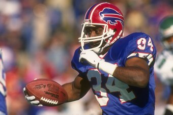2 Dec 1990: Running back Thurman Thomas of the Buffalo Bills runs with the ball during a game against the Philadelphia Eagles at Rich Stadium in Orchard Park, New York. The Bills won the game, 30-23.