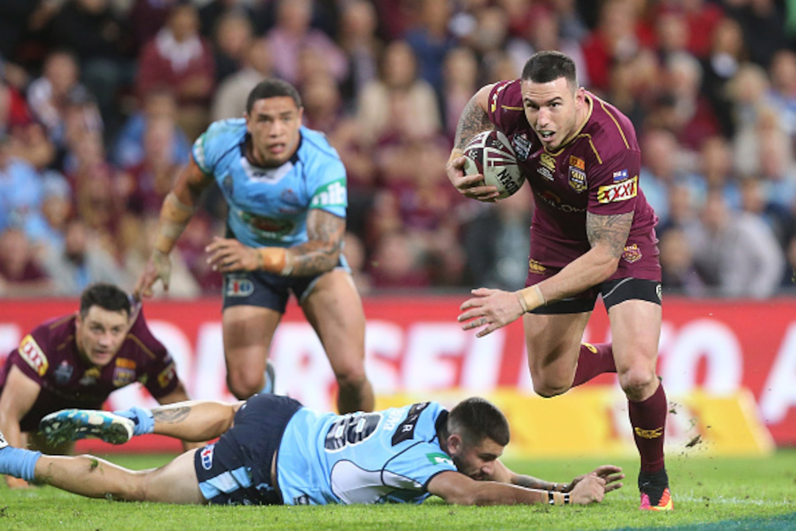 BRISBANE, AUSTRALIA - JUNE 22:  Darius Boyd of the Maroons runs the ball during game two of the State Of Origin series between the Queensland Maroons and the New South Wales Blues at Suncorp Stadium on June 22, 2016 in Brisbane, Australia.  (Photo by Chri