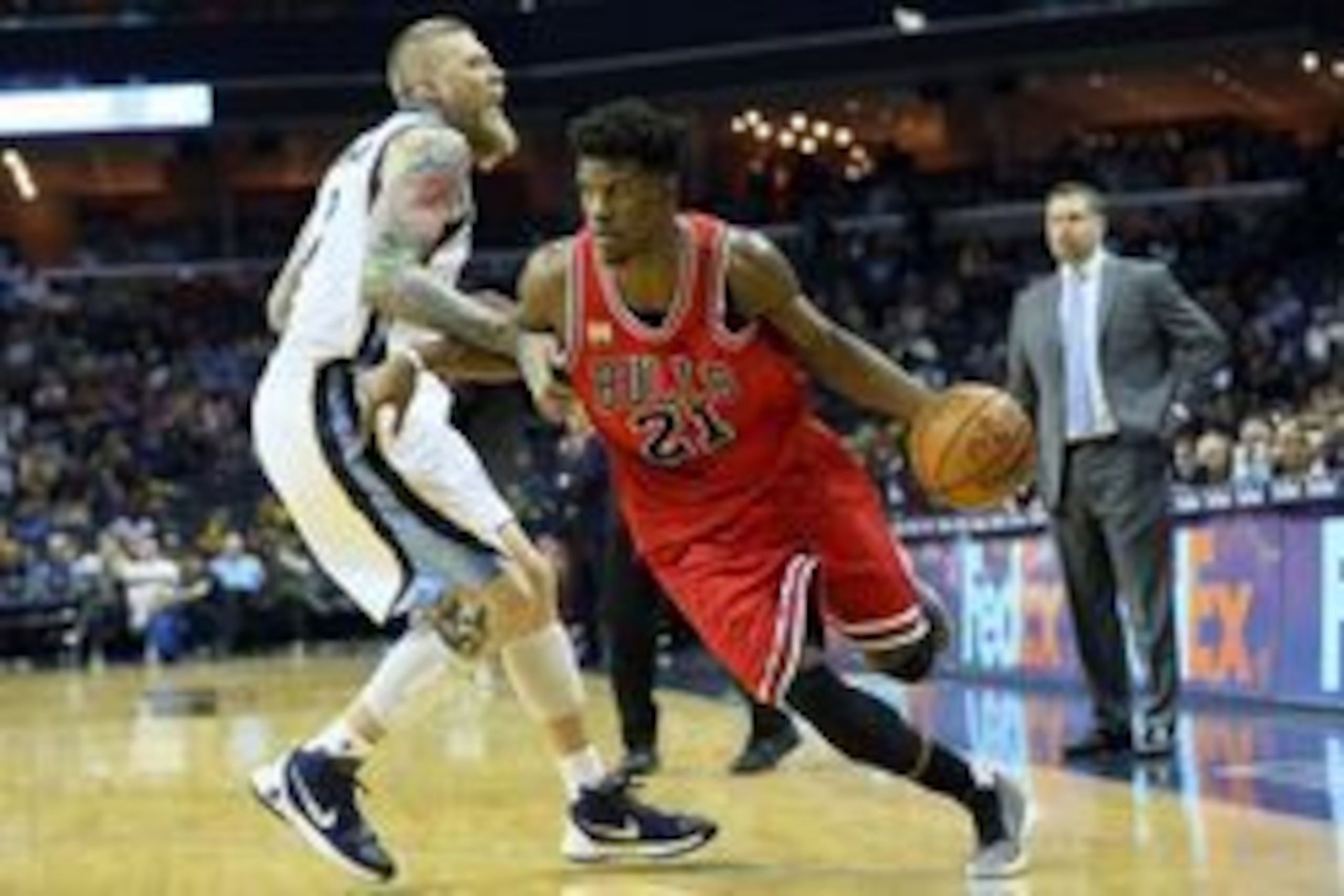 Apr 5, 2016; Memphis, TN, USA; Chicago Bulls guard Jimmy Butler (21) drives against Memphis Grizzlies center Chris Andersen (7) at FedExForum. Mandatory Credit: Nelson Chenault-USA TODAY Sports