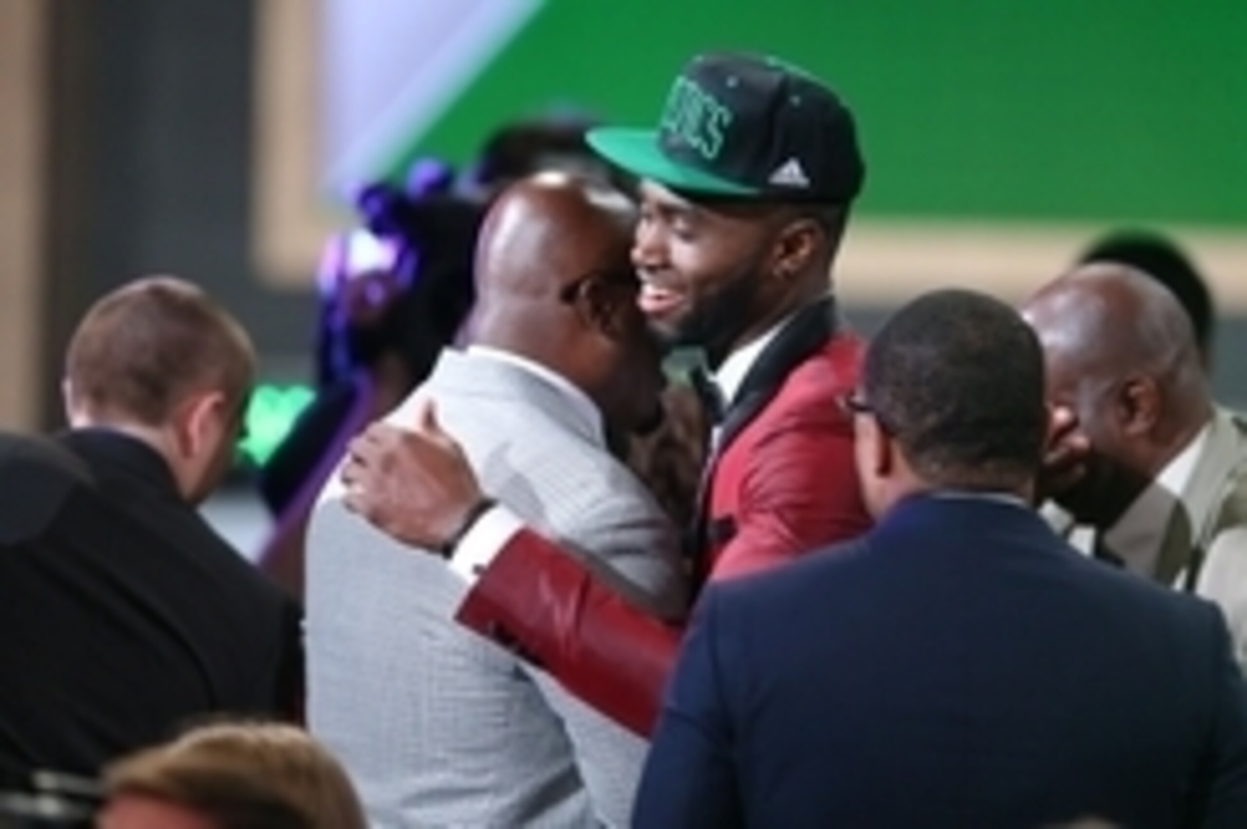 Jun 23, 2016; New York, NY, USA; Jaylen Brown (California) hugs supporters after being selected as the number three overall pick to the Boston Celtics in the first round of the 2016 NBA Draft at Barclays Center. Mandatory Credit: Jerry Lai-USA TODAY Sport Jun 23, 2016; New York, NY, USA; Jaylen Brown (California) hugs supporters after being selected as the number three overall pick to the Boston Celtics in the first round of the 2016 NBA Draft at Barclays Center. Mandatory Credit: Jerry Lai-USA TODAY Sport