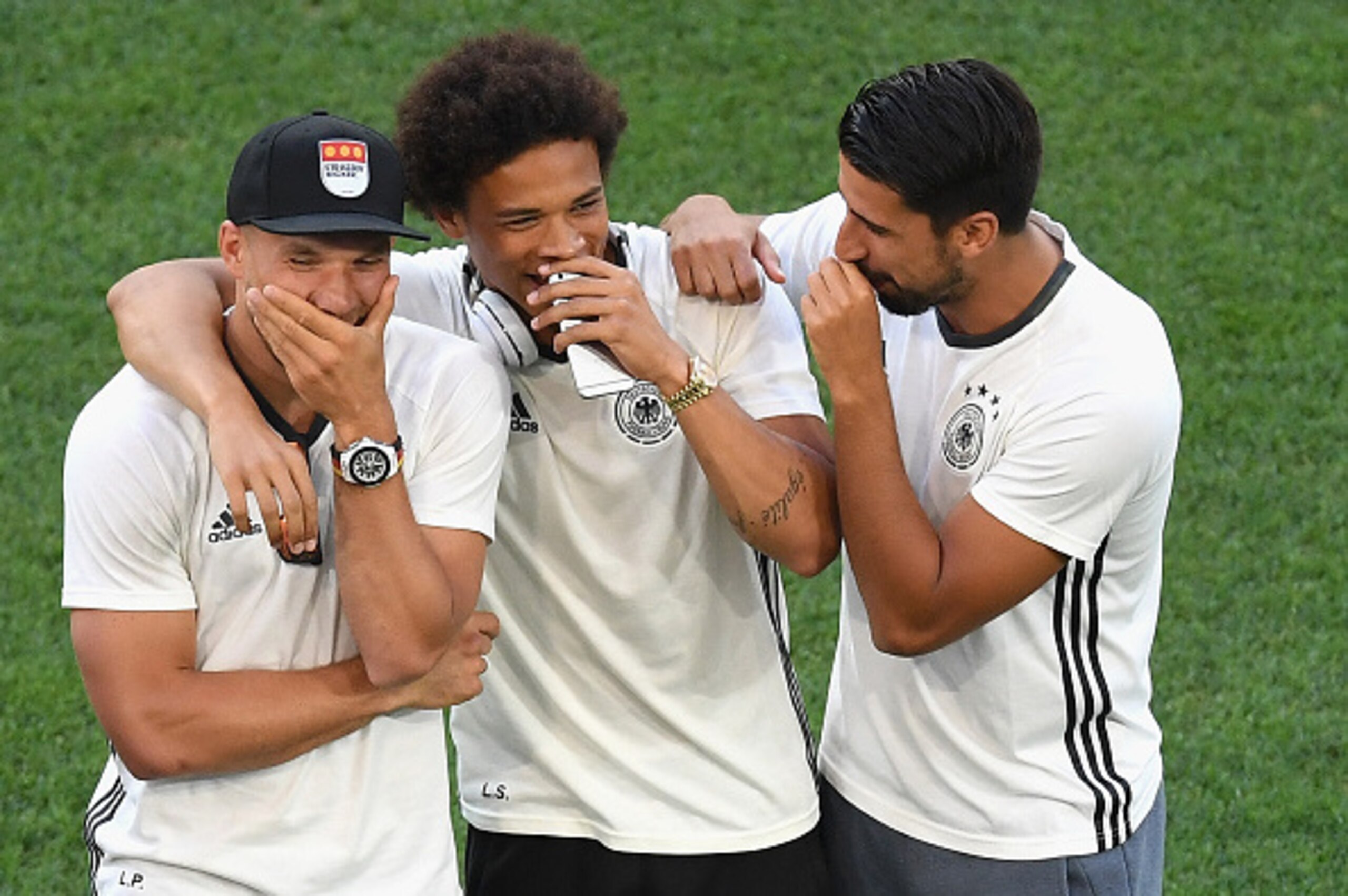 MARSEILLE, FRANCE - JULY 07: (L to R) Lukas Podolski Leroy Sane and Emre Can of Germany talk during the pitch inpection prior to the UEFA EURO semi final match between Germany and France at Stade Velodrome on July 7, 2016 in Marseille, France. (Photo by MARSEILLE, FRANCE - JULY 07: (L to R) Lukas Podolski Leroy Sane and Emre Can of Germany talk during the pitch inpection prior to the UEFA EURO semi final match between Germany and France at Stade Velodrome on July 7, 2016 in Marseille, France. (Photo by