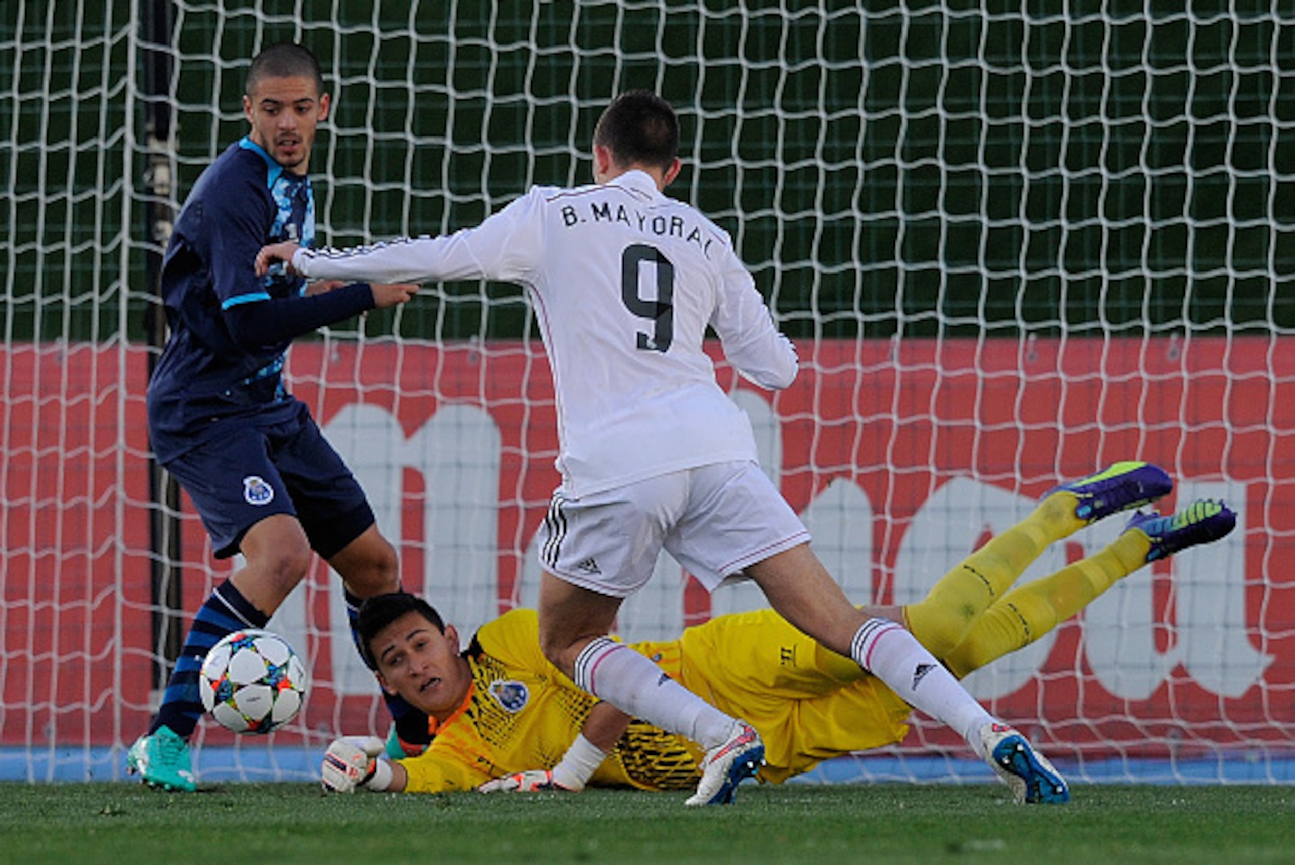 MADRID, SPAIN - FEBRUARY 17:  Raul Gudino of FC Porto saves a shot from Borja Mayoral of Real Madrid during the UEFA Youth League Round of 16 match between Real Madrid and FC Porto at Estadio Alfredo Di Stefano on February 17, 2015 in Madrid, Spain.  (Pho