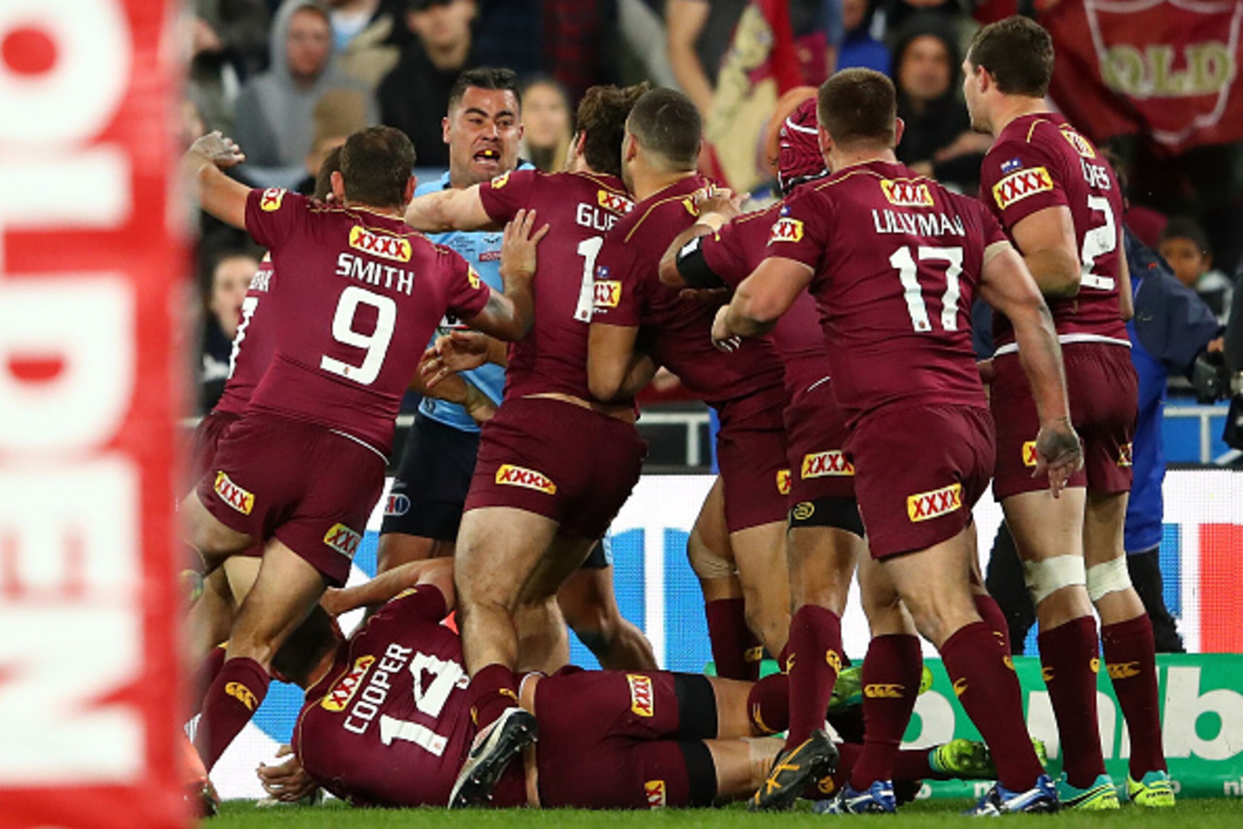 SYDNEY, AUSTRALIA - JULY 13:  Andrew Fifita of the Blues tackles Gavin Cooper of the Maroons after Cooper scores a try during game three of the State Of Origin series between the New South Wales Blues and the Queensland Maroons at ANZ Stadium on July 13, 