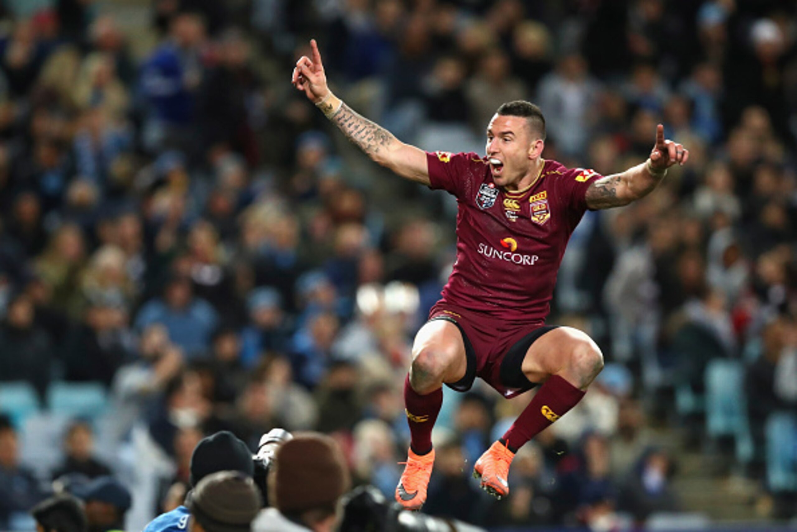 SYDNEY, AUSTRALIA - JULY 13:  Darius Boyd of the Maroons celebrates after scoring a try during game three of the State Of Origin series between the New South Wales Blues and the Queensland Maroons at ANZ Stadium on July 13, 2016 in Sydney, Australia.  (Ph