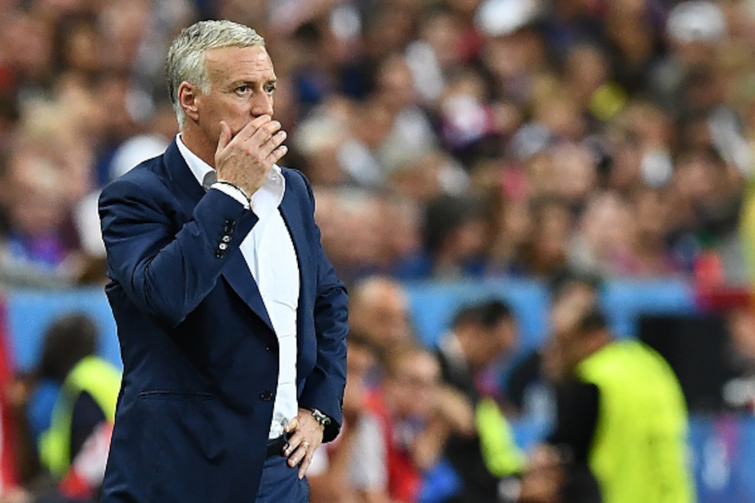 France's coach Didier Deschamps reacts as he watches the game during the Euro 2016 final football match between France and Portugal at the Stade de France in Saint-Denis, north of Paris, on July 10, 2016. / AFP / FRANCK FIFE (Photo credit should re France's coach Didier Deschamps reacts as he watches the game during the Euro 2016 final football match between France and Portugal at the Stade de France in Saint-Denis, north of Paris, on July 10, 2016. / AFP / FRANCK FIFE (Photo credit should re