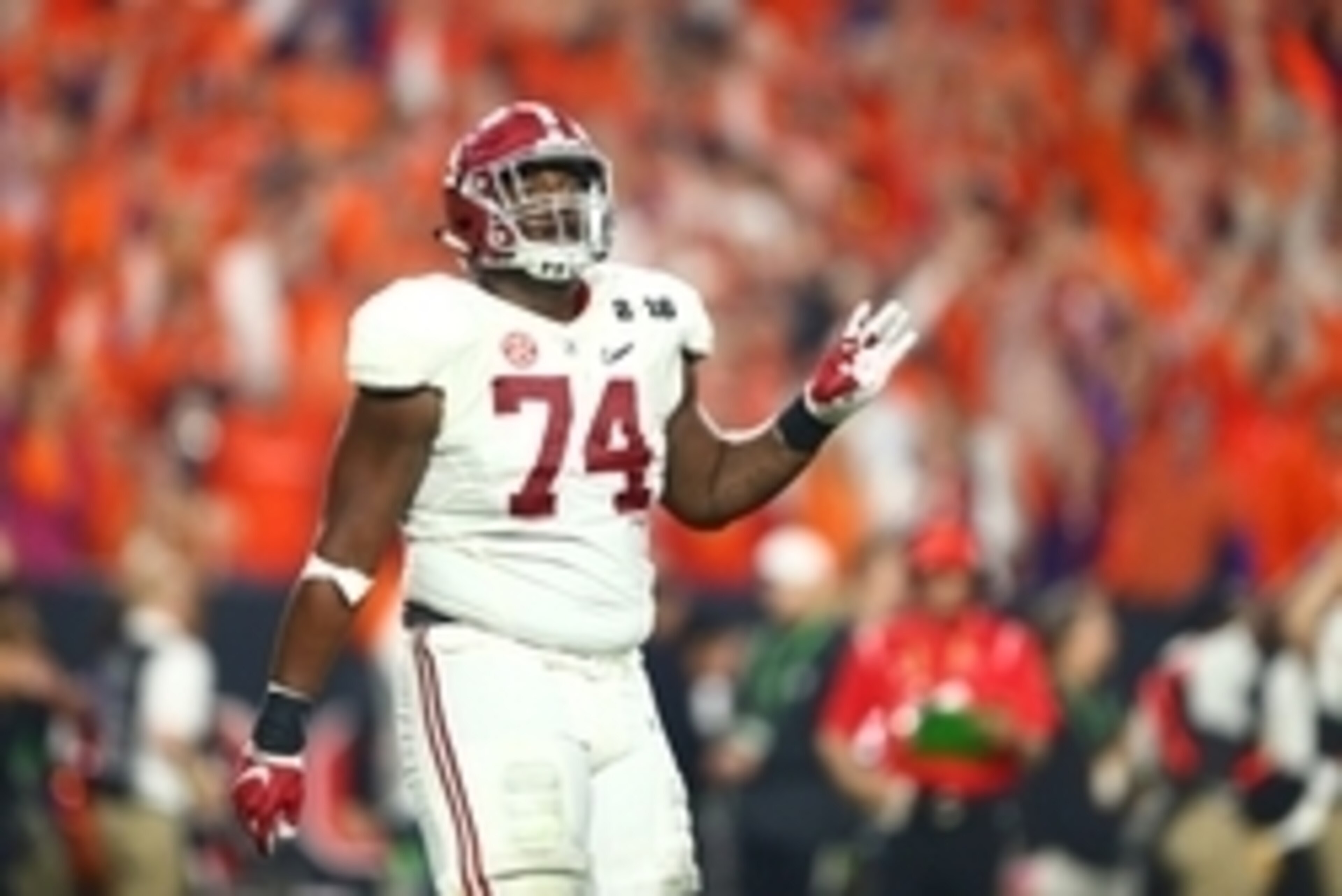 Jan 11, 2016; Glendale, AZ, USA; Alabama Crimson Tide offensive lineman Cam Robinson (74) reacts against the Clemson Tigers in the 2016 CFP National Championship at University of Phoenix Stadium. Mandatory Credit: Mark J. Rebilas-USA TODAY Sports