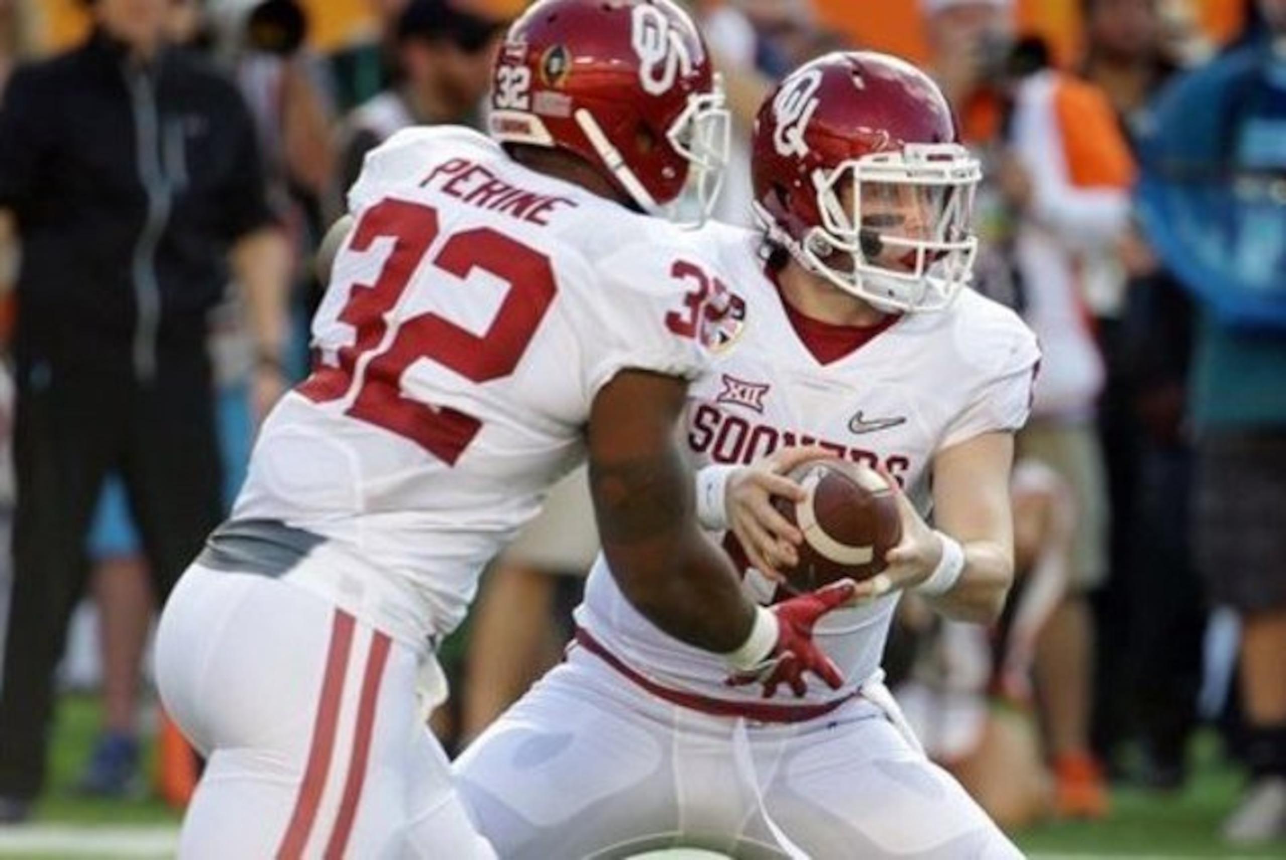 Oklahoma running back Samaje Perine and quarterback Baker Mayfield.