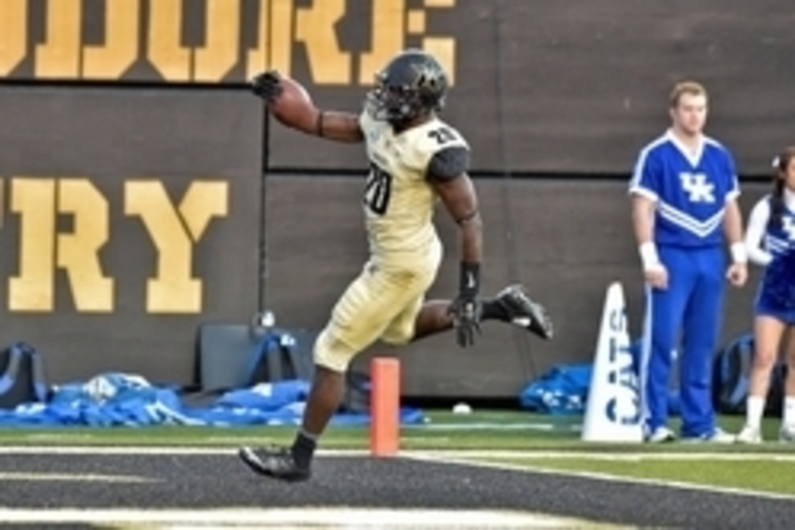 Nov 14, 2015; Nashville, TN, USA; Vanderbilt Commodores safety Oren Burks (20) intercepts a pass by Kentucky Wildcats quarterback Drew Barker (7) (not pictured) returning it for a touchdown during the first half at Vanderbilt Stadium. Mandatory Credit: Ji