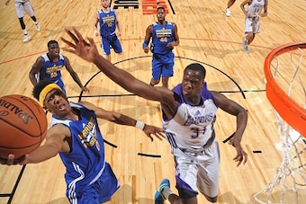 LAS VEGAS, NV - JULY 11:  Patrick McCaw #0 of the Golden State Warriors goes to the basket against Moustapha Fall #31 of the Los Angeles Lakers during the 2016 NBA Las Vegas Summer League on July 11, 2016 at The Thomas & Mack Center in Las Vegas, Nevada. 