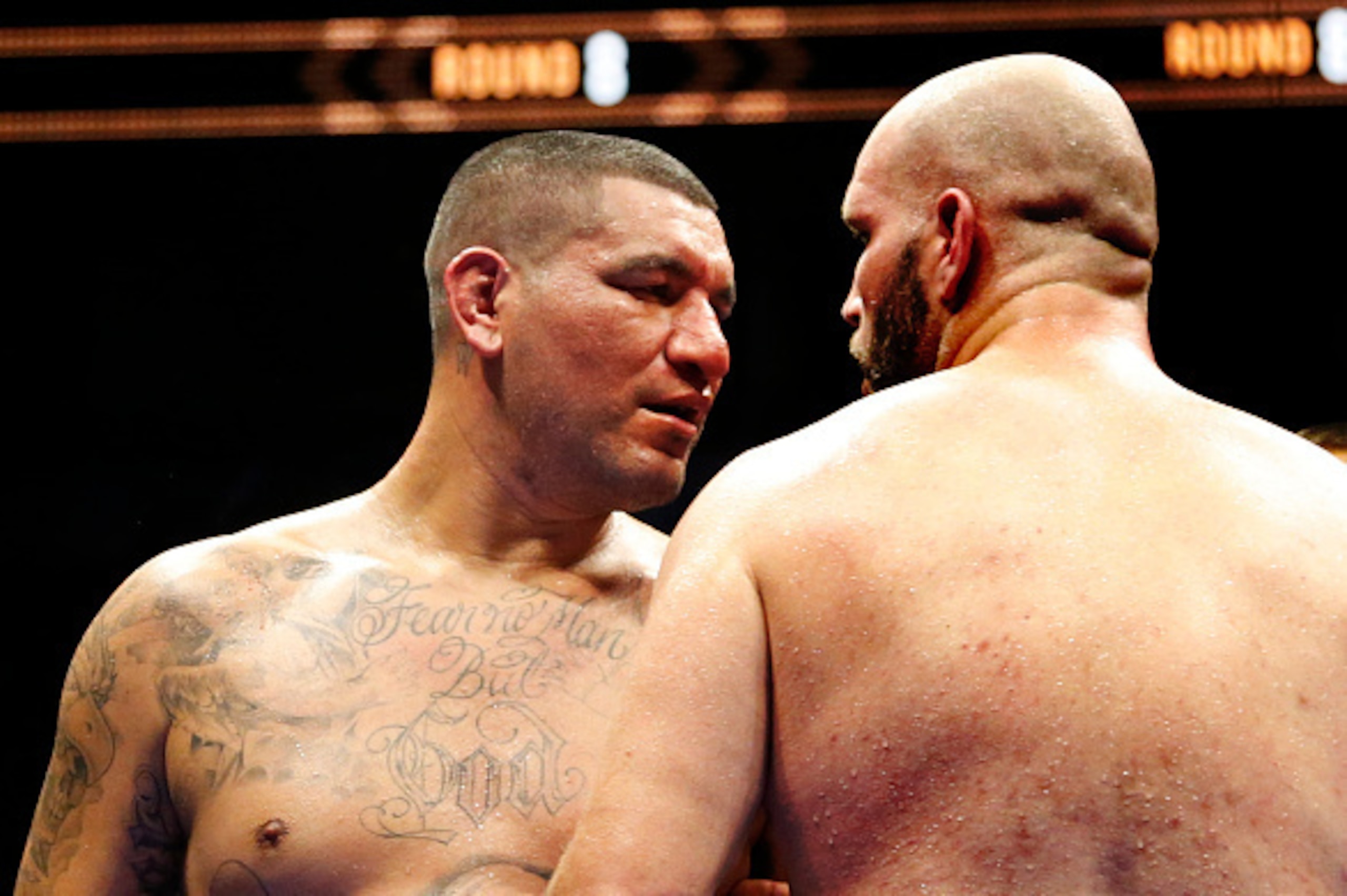 SAN ANTONIO,TX - DECEMBER 12:  Chris Arreola(L) has words with Travis Kauffman at the end of one of their rounds in a heavyweight bout at AT&T Center on December 12, 2015 in San Antonio,Texas.  (Photo by Ronald Cortes/Getty Images)