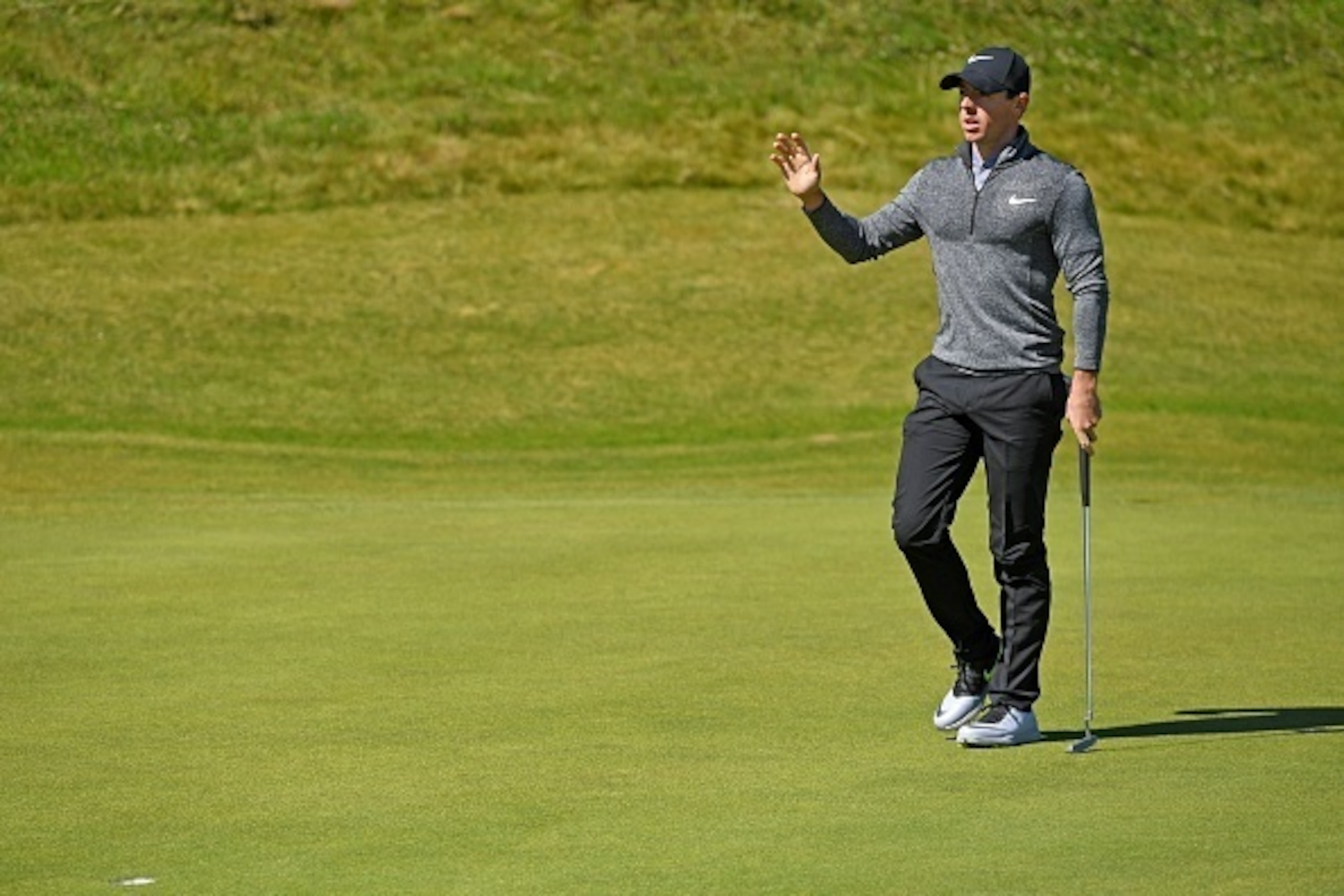 Northern Ireland's Rory McIlroy reacts to making his putt on the 6th Green during his first round on the opening day of the 2016 British Open Golf Championship at Royal Troon in Scotland on July 14, 2016.
All eyes were on golf's so-called 'Big Four' as th
