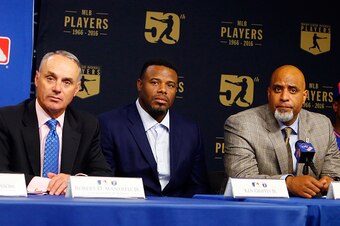 NEW YORK, NY - JUNE 16:  (L-R) Commissioner of Baseball Robert D. Manfred Jr., 2016 Hall of Fame inductee Ken Griffey Jr. and MLBPA Executive Director Tony Clark look on during a press conference on youth initiatives hosted by Major League Baseball and th