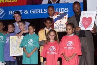 (l to r) Mark Wahlberg, Texas Rangers shortstop Alex Rodriguez, and Reds centerfielder Ken Griffey, Jr. with members of the Boys & Girls Club at the launch of 'Campaign 3 P.M.' at the Waldorf-Astoria Hotel in New York City.  The campaign is part of the Bo