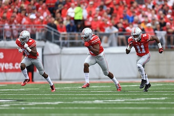 COLUMBUS, OH - SEPTEMBER 19: Cornerback Gareon Conley #8, linebacker Dante Booker #33 and safety Vonn Bell #11 of the Ohio State Buckeyes against the Northern Illinois Huskies at Ohio Stadium on September 19, 2015 in Columbus, Ohio.  (Photo by Andrew Webe