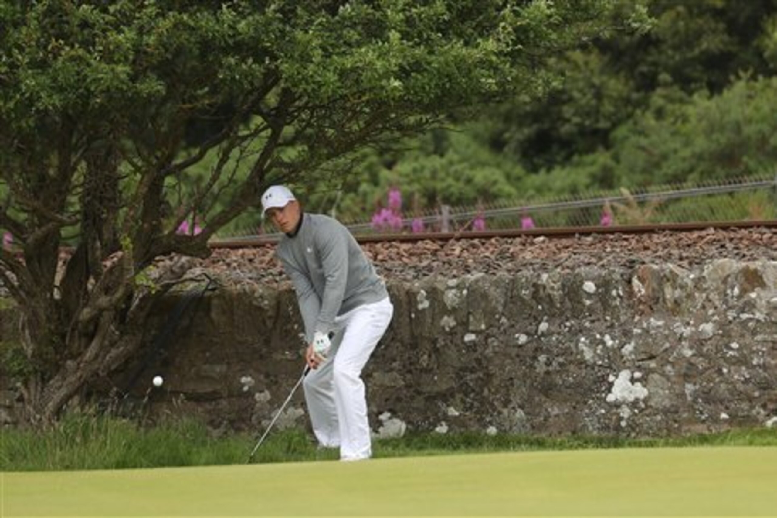 Spieth struggled against the elements on the back nine.