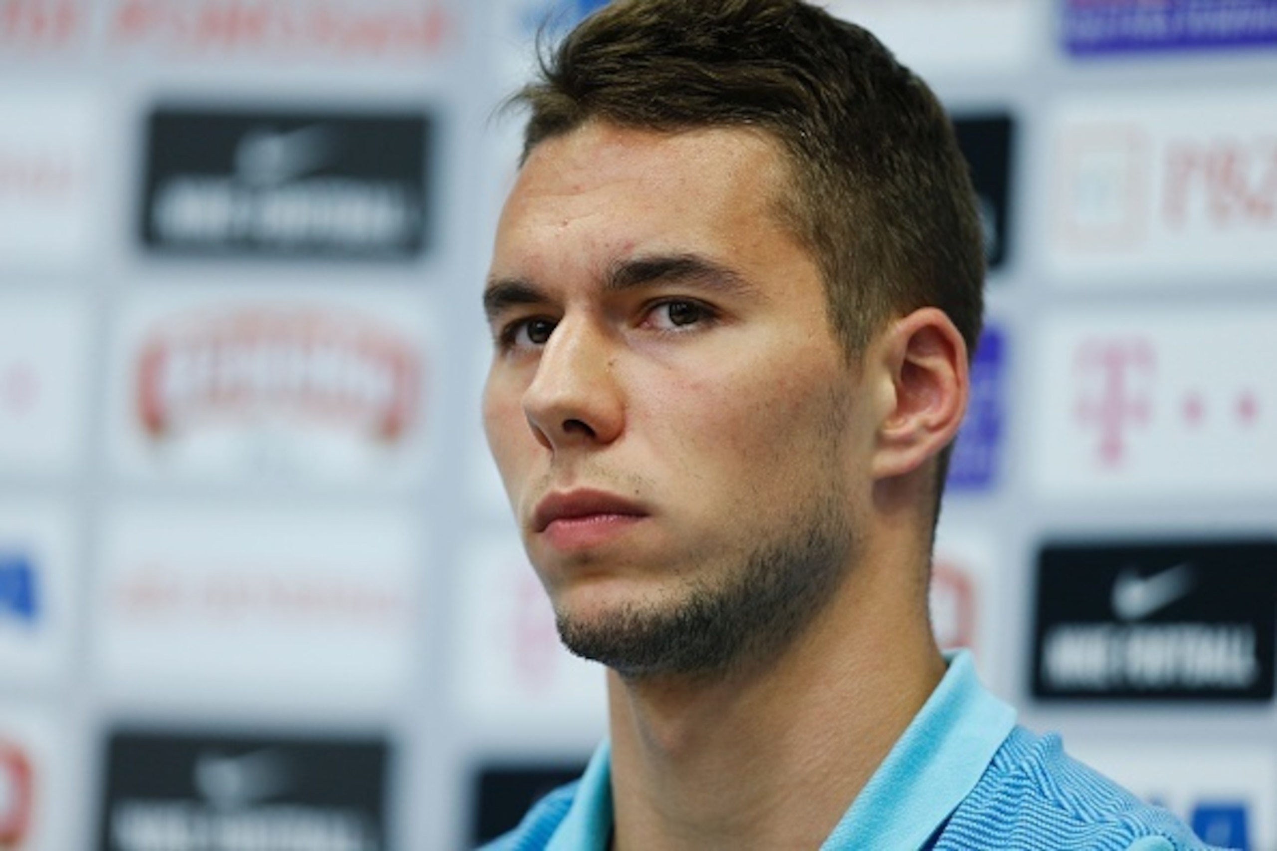 CORRECTION - Croatia's forward Marko Pjaca addresses a press conference in Deauville, north west France, on June 22, 2016, during the Euro 2016 football tournament.  / AFP / CHARLY TRIBALLEAU / The erroneous mention[s] appearing in the metadata of this ph