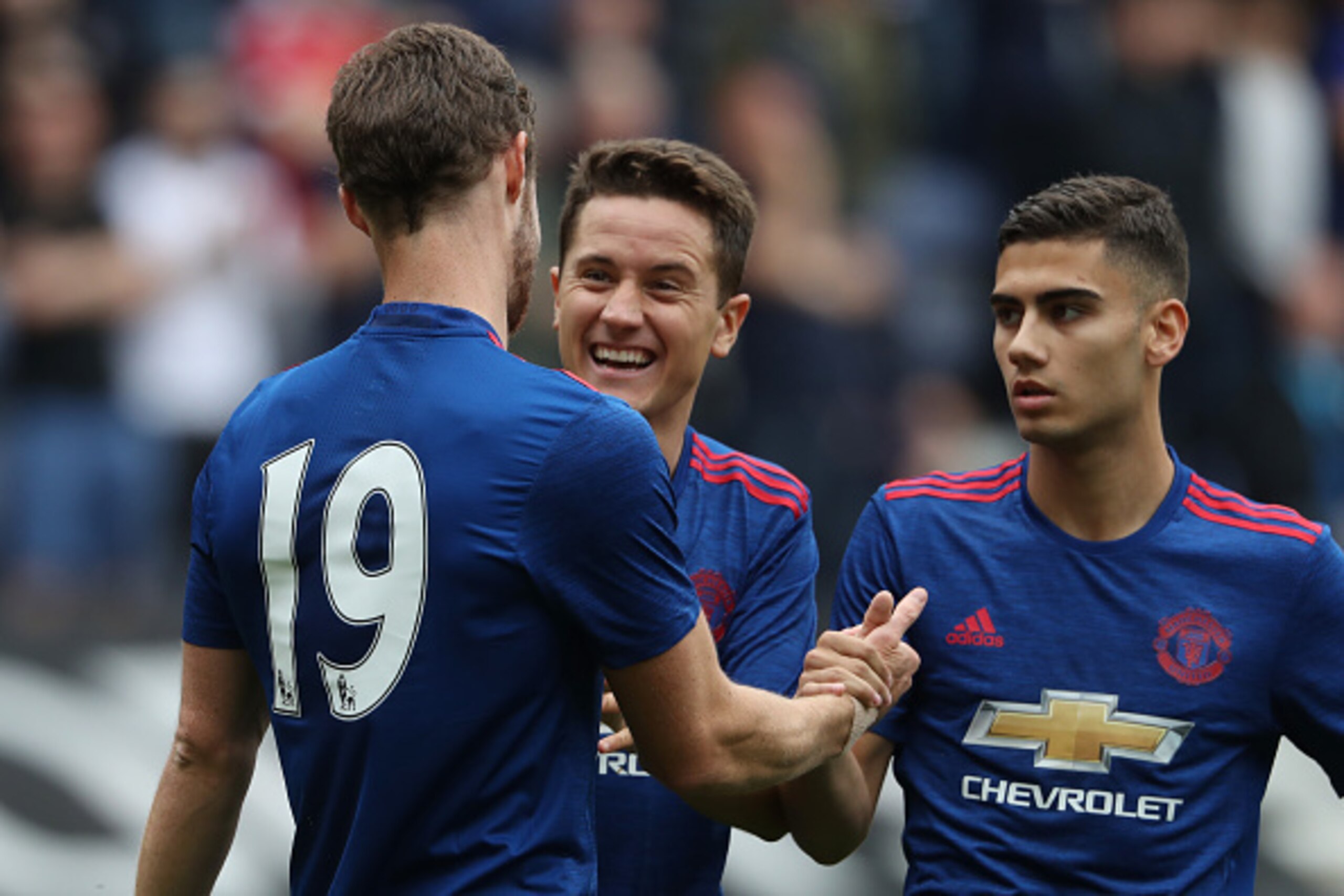 WIGAN, ENGLAND - JULY 16: Will Keane of Manchester United celebrates after scoring a goal to make it 0-1 with Ander Herrera and Andreas Pereira during the pre-season friendly between Wigan Athletic and Manchester United at JJB Stadium on July 16, 2016 in WIGAN, ENGLAND - JULY 16: Will Keane of Manchester United celebrates after scoring a goal to make it 0-1 with Ander Herrera and Andreas Pereira during the pre-season friendly between Wigan Athletic and Manchester United at JJB Stadium on July 16, 2016 in