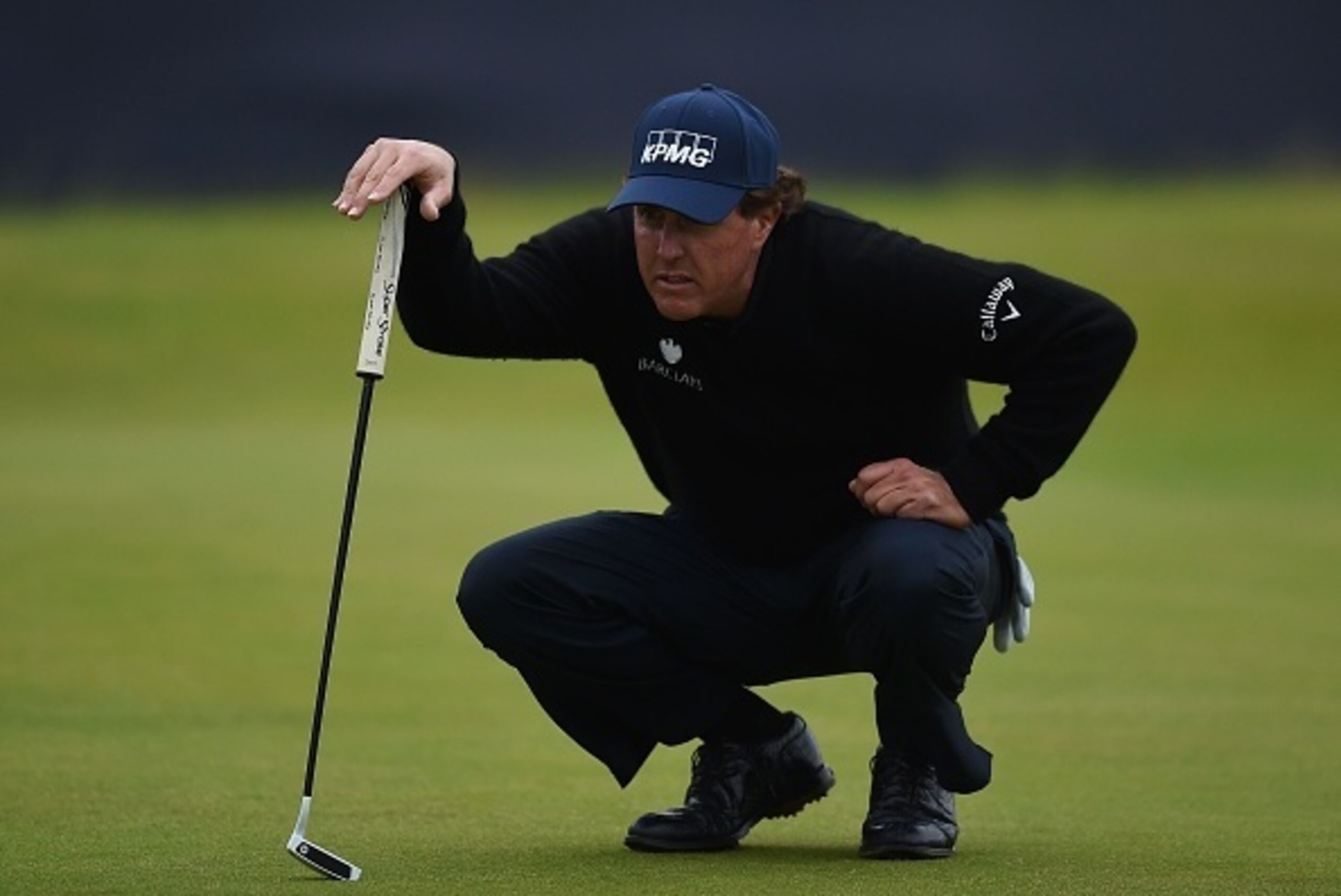 US golfer Phil Mickelson lines up a putt on the 18th hole during his third round 70 on day three of the 2016 British Open Golf Championship at Royal Troon in Scotland on July 16, 2016.
Sweden's Henrik Stenson leads the British Open by a single shot from P