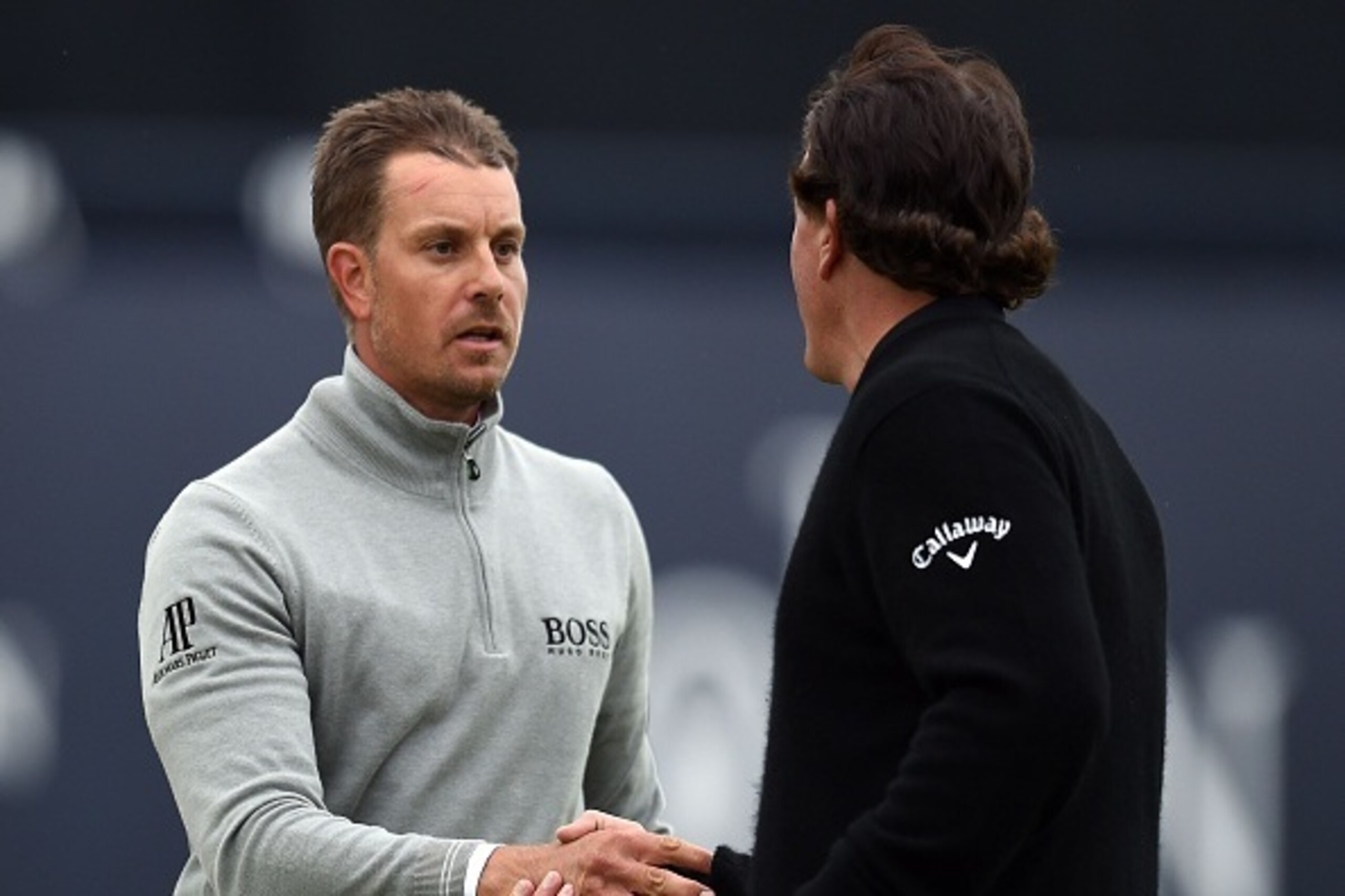 US golfer Phil Mickelson (R) and Sweden's Henrik Stenson shakes hands on the 18th green after their third rounds on day three of the 2016 British Open Golf Championship at Royal Troon in Scotland on July 16, 2016.
Sweden's Henrik Stenson leads the British