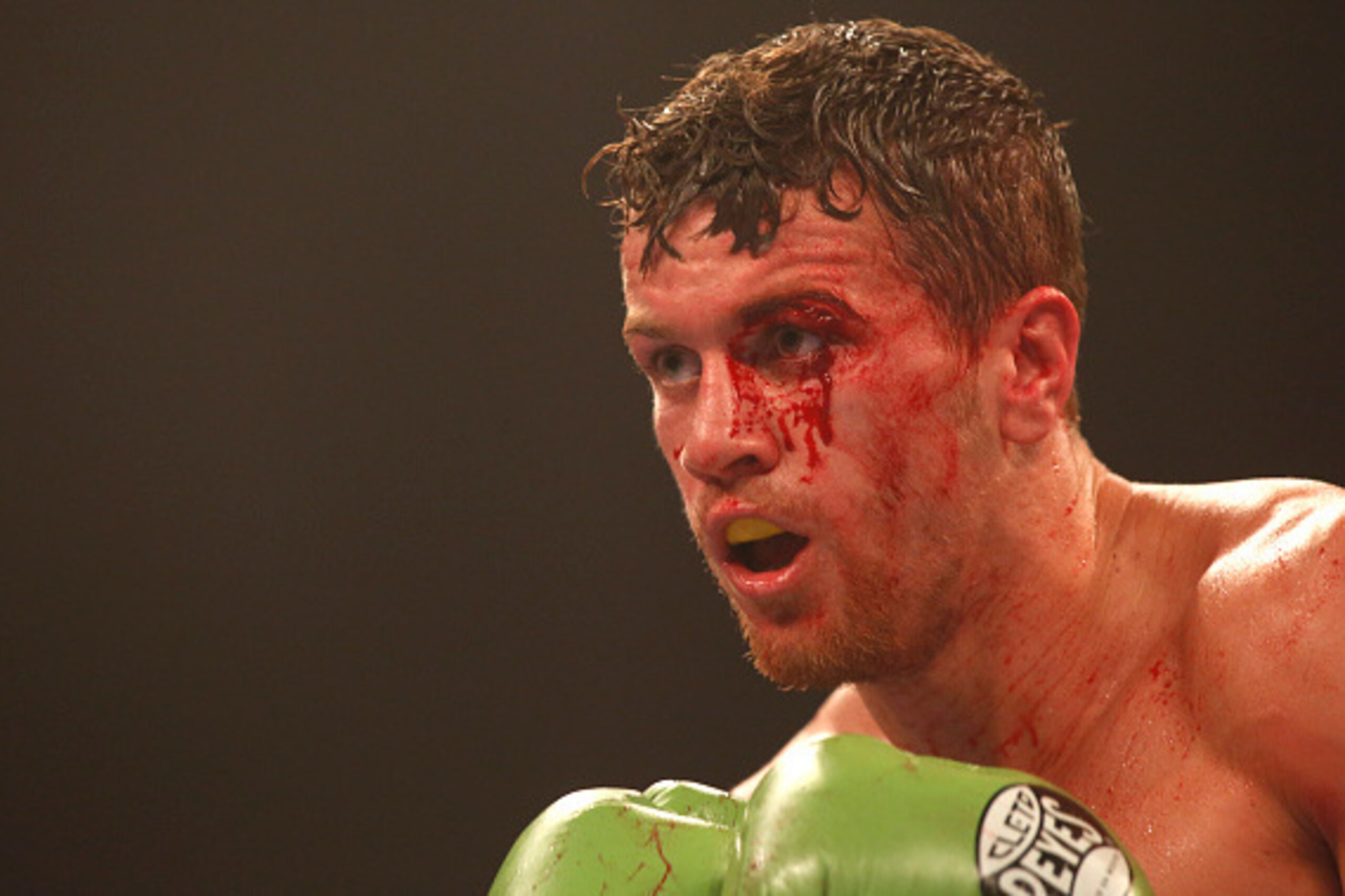 CARDIFF, WALES - JULY 16: Gary Corcoran of Great Britain in action against Liam Williams of Wales during their British and Commonwealth Super-Welterweight Championship bout at Cardiff Ice Arena on July 16, 2016 in Cardiff, Wales. (Photo by Julian Herbert/