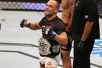 LAS VEGAS, NV - JULY 07:  Eddie Alvarez celebrates after knocking out Rafael Dos Anjos of Brazil to win the UFC lightweight championship during the UFC Fight Night event inside the MGM Grand Garden Arena on July 7, 2016 in Las Vegas, Nevada. (Photo by Ed 