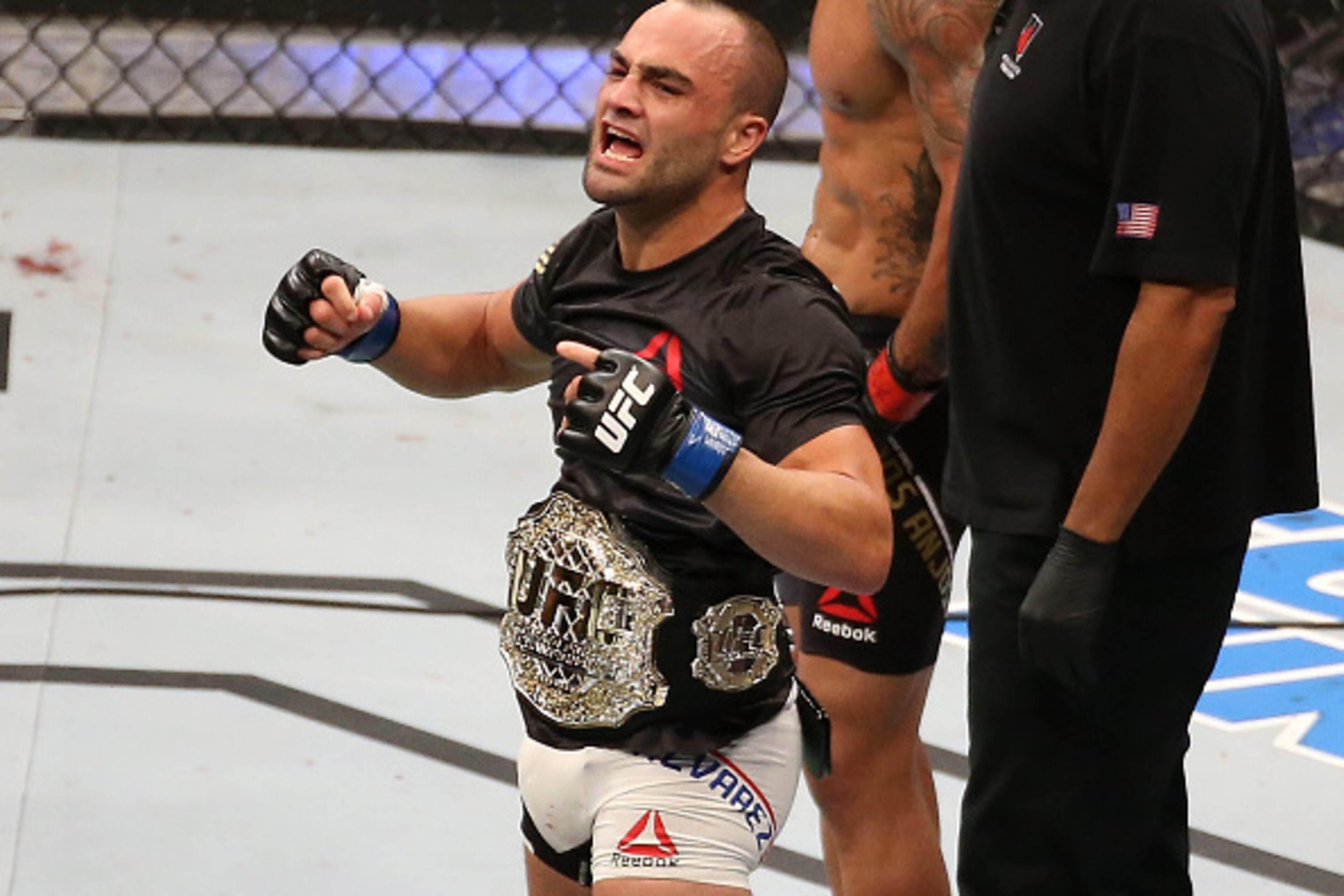 LAS VEGAS, NV - JULY 07:  Eddie Alvarez celebrates after knocking out Rafael Dos Anjos of Brazil to win the UFC lightweight championship during the UFC Fight Night event inside the MGM Grand Garden Arena on July 7, 2016 in Las Vegas, Nevada. (Photo by Ed 