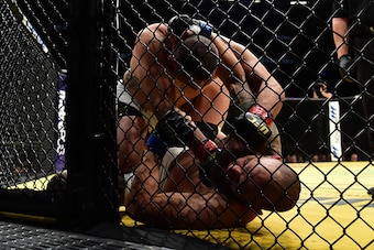 LAS VEGAS, NV - JULY 09: Cain Velasquez (top) punches Travis Browne in their heavyweight bout during the UFC 200 event on July 9, 2016 at T-Mobile Arena in Las Vegas, Nevada.  (Photo by Harry How/Zuffa LLC/Zuffa LLC via Getty Images)