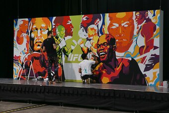 LAS VEGAS, NV - JULY 10:  A UFC 200 mural is painted during day 3 of the UFC Expo at the Las Vegas Convention Center on July 10, 2016 in Las Vegas, Nevada. (Photo by Ed Mulholland/Zuffa LLC/Zuffa LLC via Getty Images)