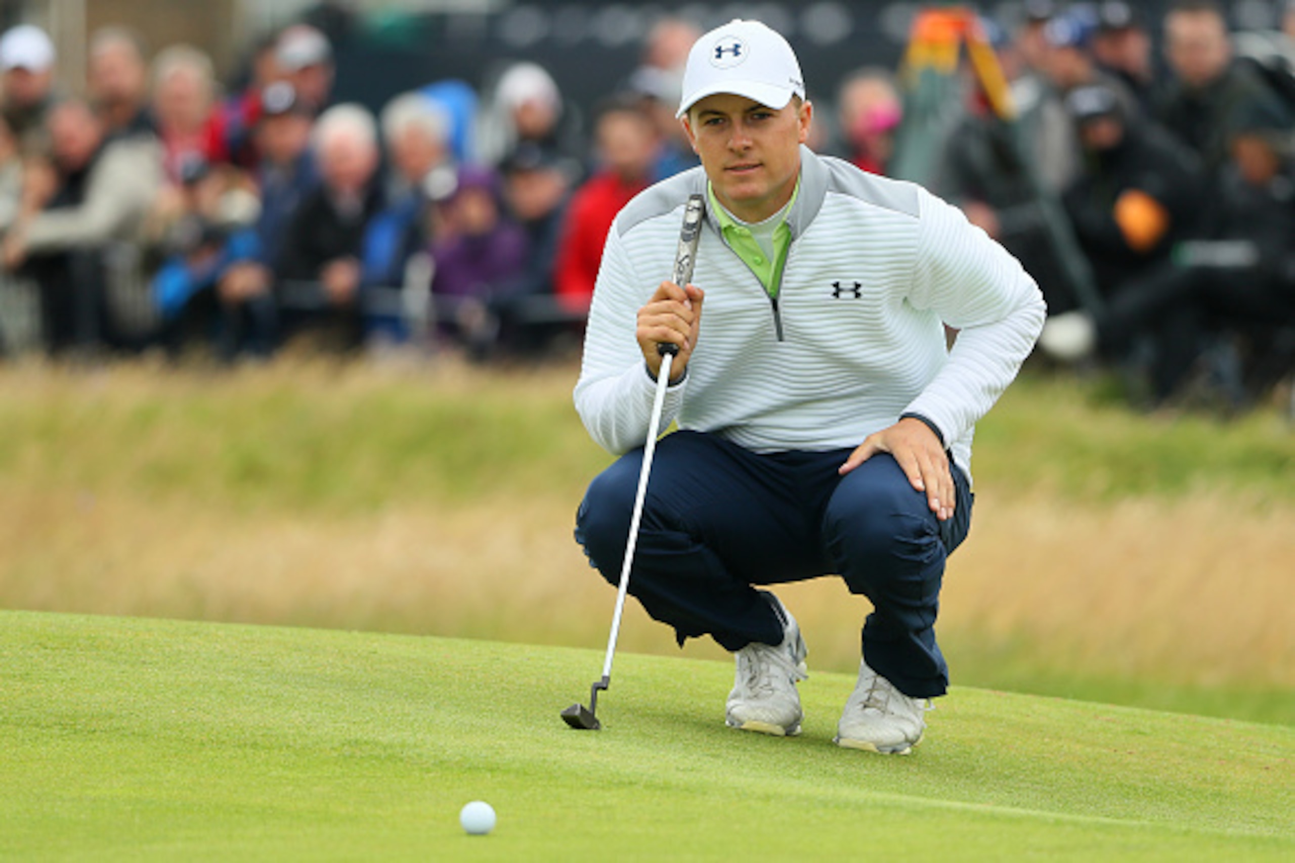 TROON, SCOTLAND - JULY 17:  Jordan Spieth of the United States lines up a putt on the 1st green during the final round on day four of the 145th Open Championship at Royal Troon on July 17, 2016 in Troon, Scotland.  (Photo by Andrew Redington/Getty Images)