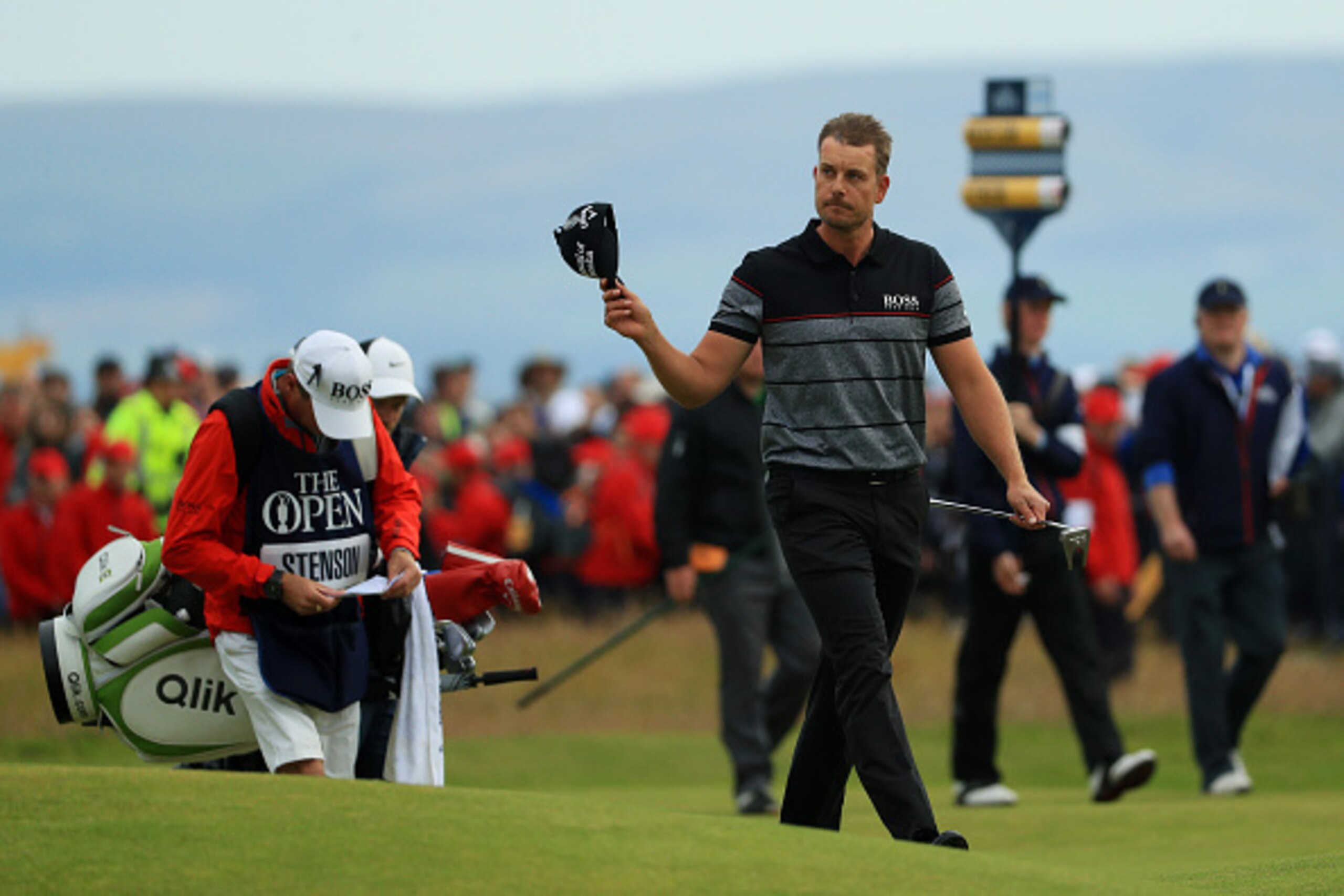 TROON, SCOTLAND - JULY 17:  Henrik Stenson of Sweden acknowledges the crowd as he walks on the on the 18th hole during the final round on day four of the 145th Open Championship at Royal Troon on July 17, 2016 in Troon, Scotland.  (Photo by Mike Ehrmann/G