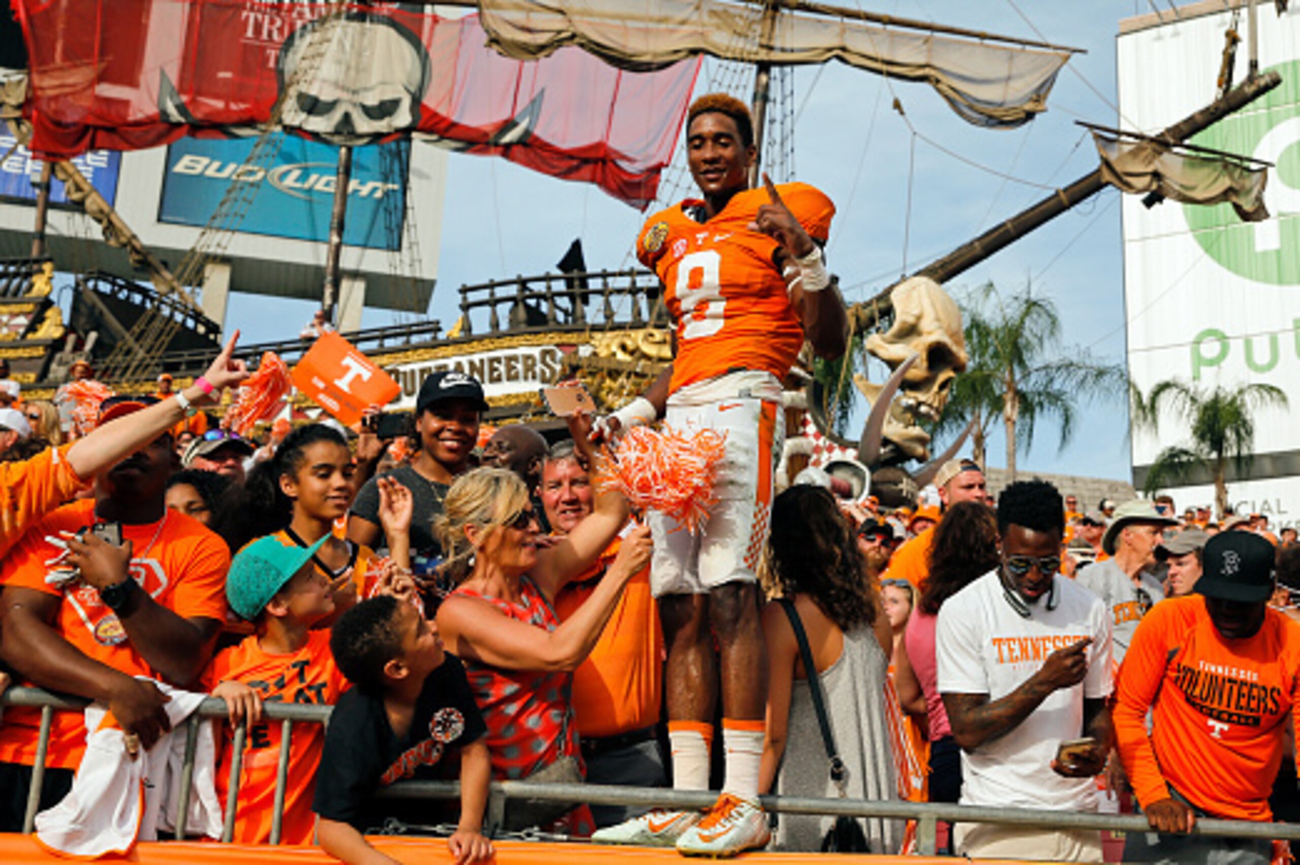 TAMPA, FL - JANUARY 1: Justin Martin #8 of the Tennessee Volunteers joins fans to celebrate a win over the Northwestern Wildcats in the Outback Bowl at Raymond James Stadium on January 1, 2016 in Tampa, Florida. (Photo by Mike Carlson/Getty Images) TAMPA, FL - JANUARY 1: Justin Martin #8 of the Tennessee Volunteers joins fans to celebrate a win over the Northwestern Wildcats in the Outback Bowl at Raymond James Stadium on January 1, 2016 in Tampa, Florida. (Photo by Mike Carlson/Getty Images)