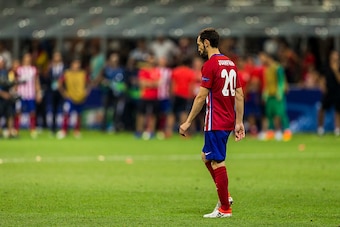 MILAN, ITALY - MAY 28: Juanfran of Atletico Madrid dejected after missing his penalty during the UEFA Champions League Final between Real Madrid and Atletico Madrid at Stadio Giuseppe Meazza on May 28, 2016 in Milan, Italy. (Photo by MICHAEL CAMPANELLA/Ge