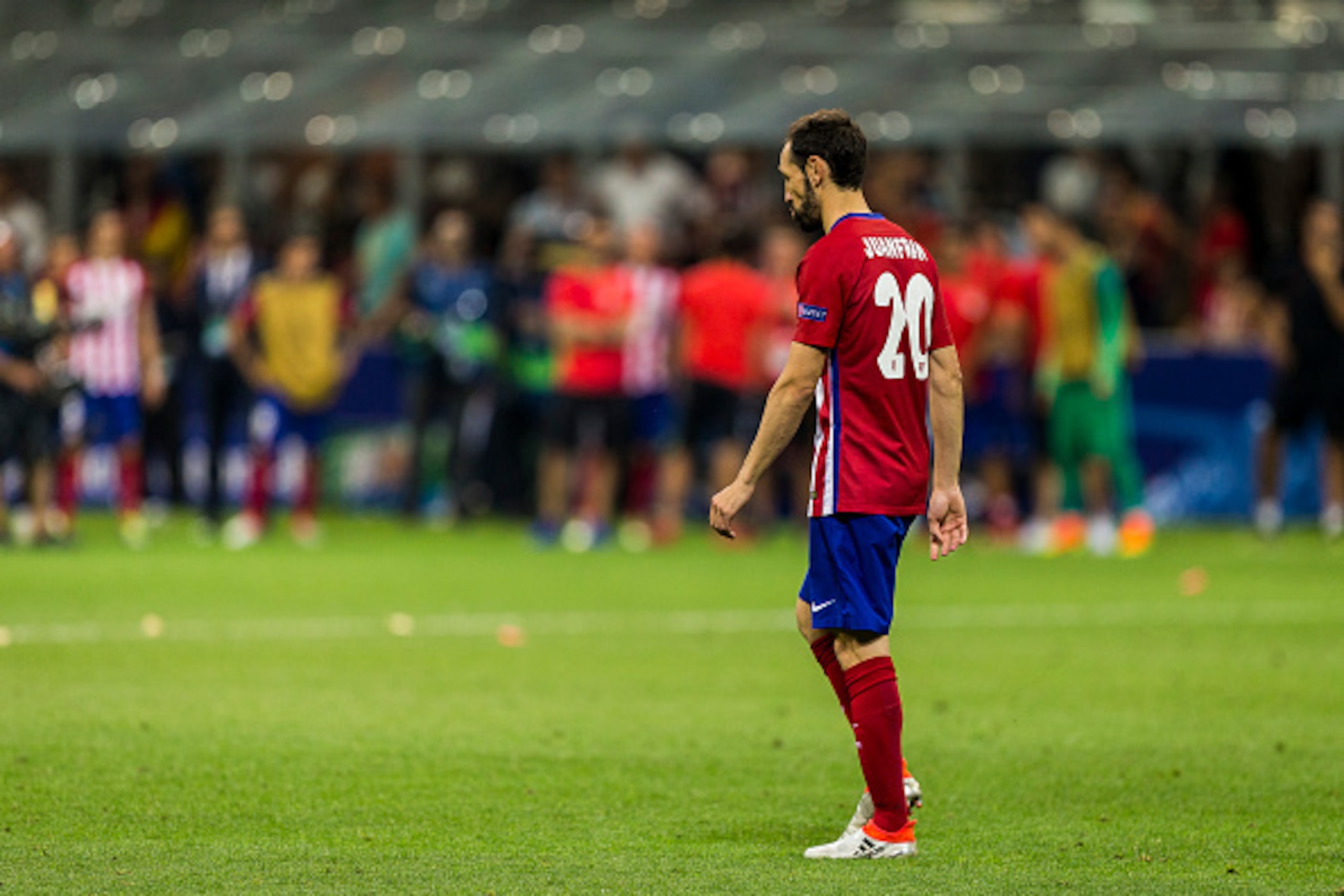MILAN, ITALY - MAY 28: Juanfran of Atletico Madrid dejected after missing his penalty during the UEFA Champions League Final between Real Madrid and Atletico Madrid at Stadio Giuseppe Meazza on May 28, 2016 in Milan, Italy. (Photo by MICHAEL CAMPANELLA/Ge