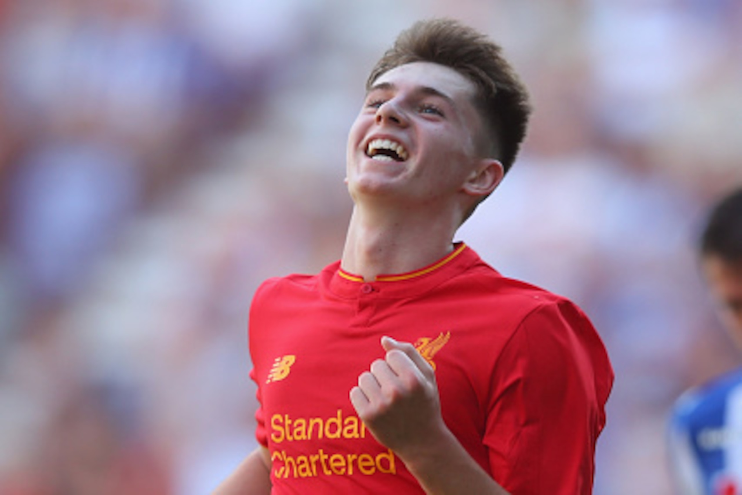 WIGAN, ENGLAND - JULY 17: Ben Woodburn of Liverpool celebrates after scoring the second goal during a pre-season friendly between Wigan Athletic and Liverpool at JJB Stadium on July 17, 2016 in Wigan, England. (Photo by Alex Livesey/Getty Images) WIGAN, ENGLAND - JULY 17: Ben Woodburn of Liverpool celebrates after scoring the second goal during a pre-season friendly between Wigan Athletic and Liverpool at JJB Stadium on July 17, 2016 in Wigan, England. (Photo by Alex Livesey/Getty Images)