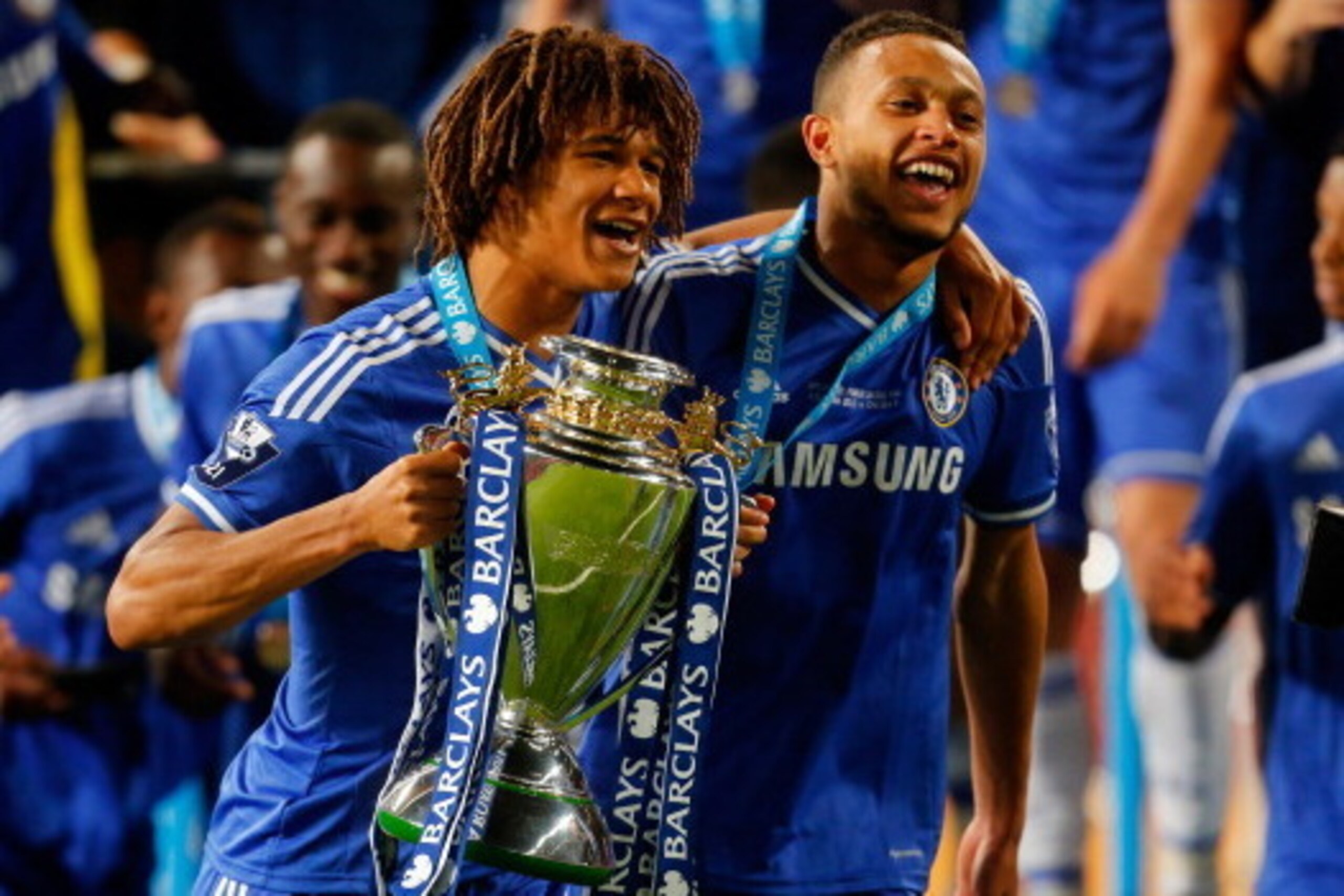 MANCHESTER, ENGLAND - MAY 14: Nathan Ake (L) and Lewis Baker of Chelsea celebrate with the trophy after the Barclays Under-21 Premier League Final match between Manchester United and Chelsea at Old Trafford on May 14, 2014 in Manchester, England. (Photo b MANCHESTER, ENGLAND - MAY 14: Nathan Ake (L) and Lewis Baker of Chelsea celebrate with the trophy after the Barclays Under-21 Premier League Final match between Manchester United and Chelsea at Old Trafford on May 14, 2014 in Manchester, England. (Photo b
