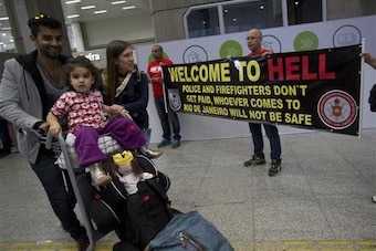 Protestors in Brazil warn against potential dangers while visiting Rio.