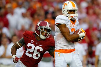 TUSCALOOSA, AL - OCTOBER 24:  Josh Malone #3 of the Tennessee Volunteers pulls in this reception against Marlon Humphrey #26 of the Alabama Crimson Tide at Bryant-Denny Stadium on October 24, 2015 in Tuscaloosa, Alabama.  (Photo by Kevin C. Cox/Getty Imag