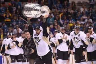 Jun 12, 2016; San Jose, CA, USA; Pittsburgh Penguins center Matt Cullen (7) hoists the Stanley Cup after defeating the San Jose Sharks in game six of the 2016 Stanley Cup Final at SAP Center at San Jose. Mandatory Credit: Gary A. Vasquez-USA TODAY Sports